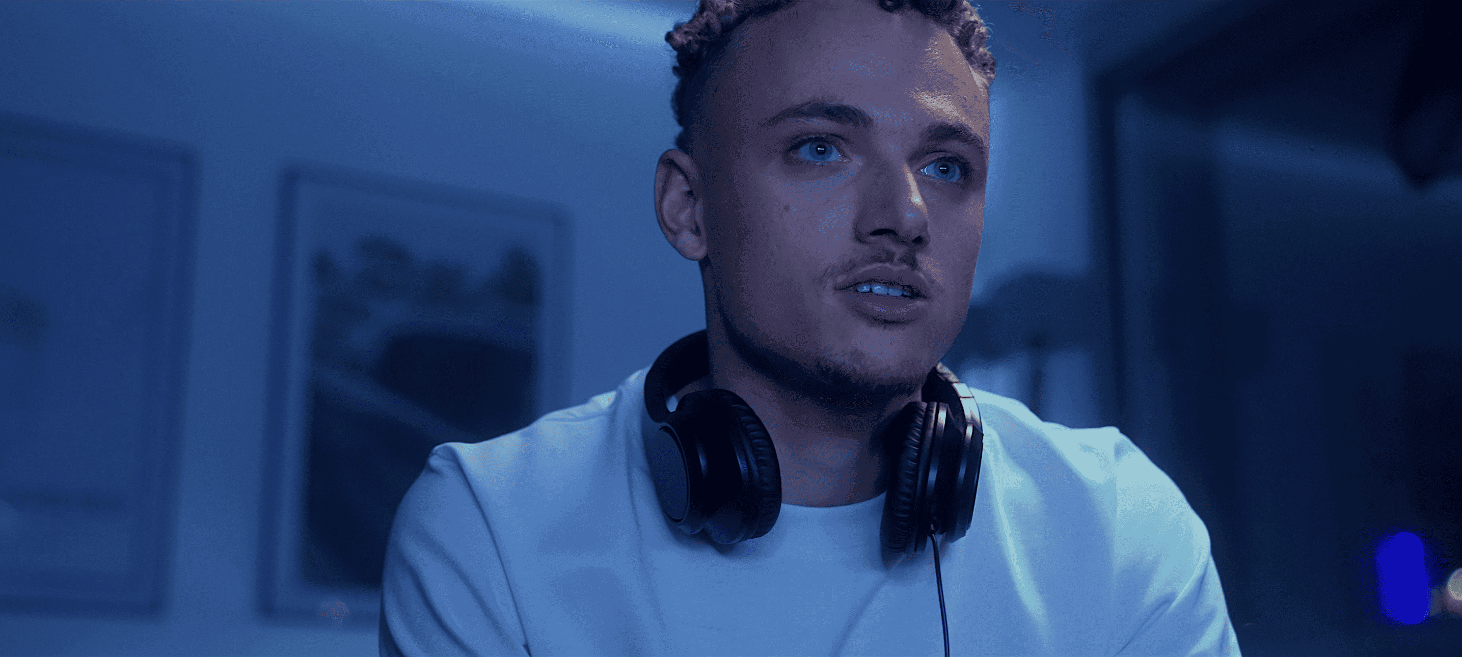 Streetside billboard with flyposters of the Batch.Works brand and illustrations