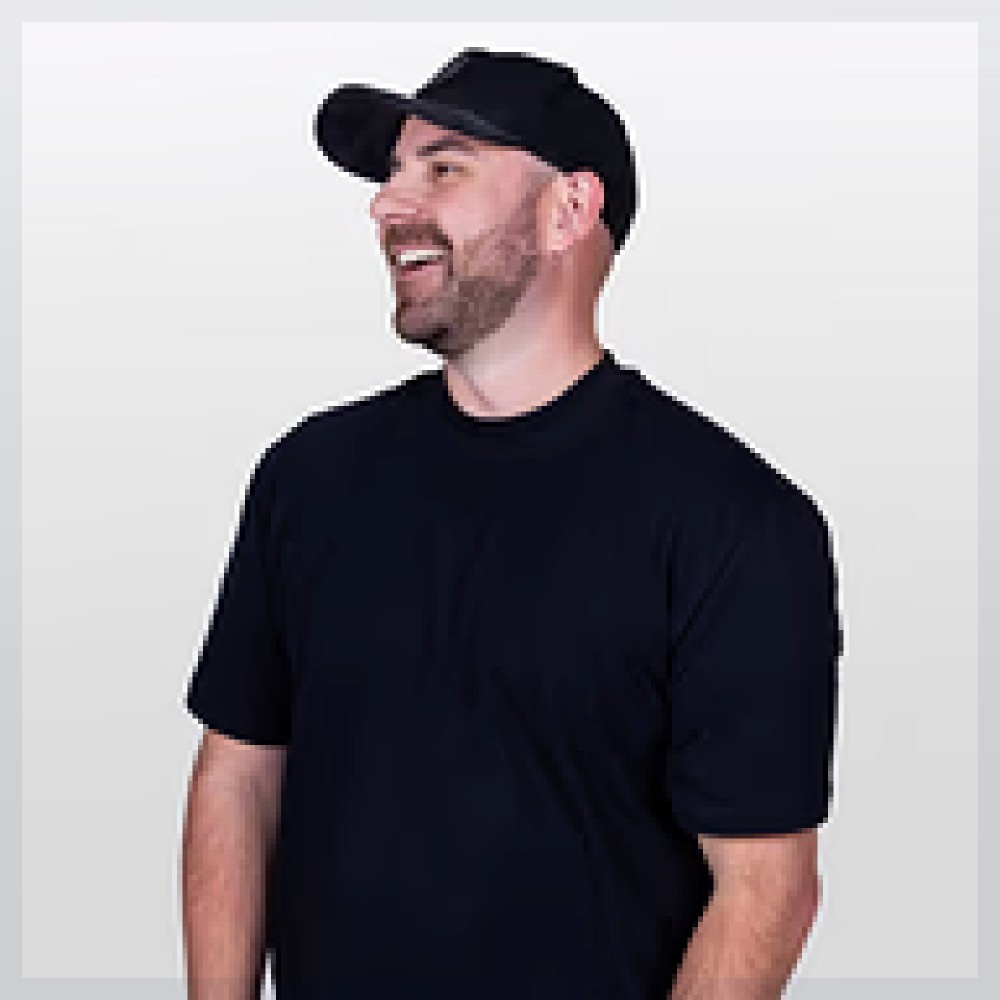 Professional woman smiling confidently in business attire.