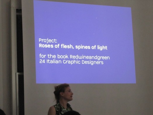 purple projection on board with woman in front