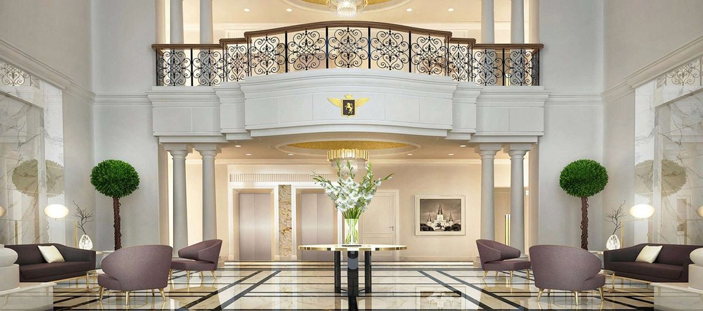 Vincitore Wellness Estate lobby showcasing a beautiful display of plants and flowers in the middle of the space.