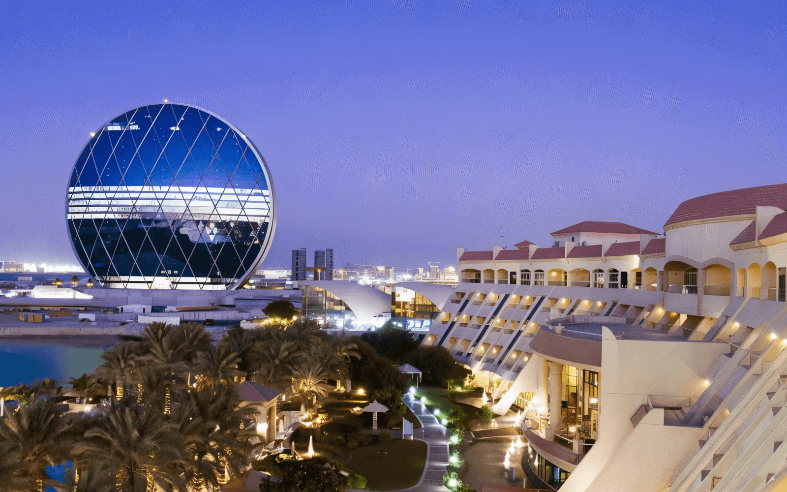 MuThe night view from the top of Mazyad Mall, showcasing city lights and a starry sky.ssafah Abu Dhabi