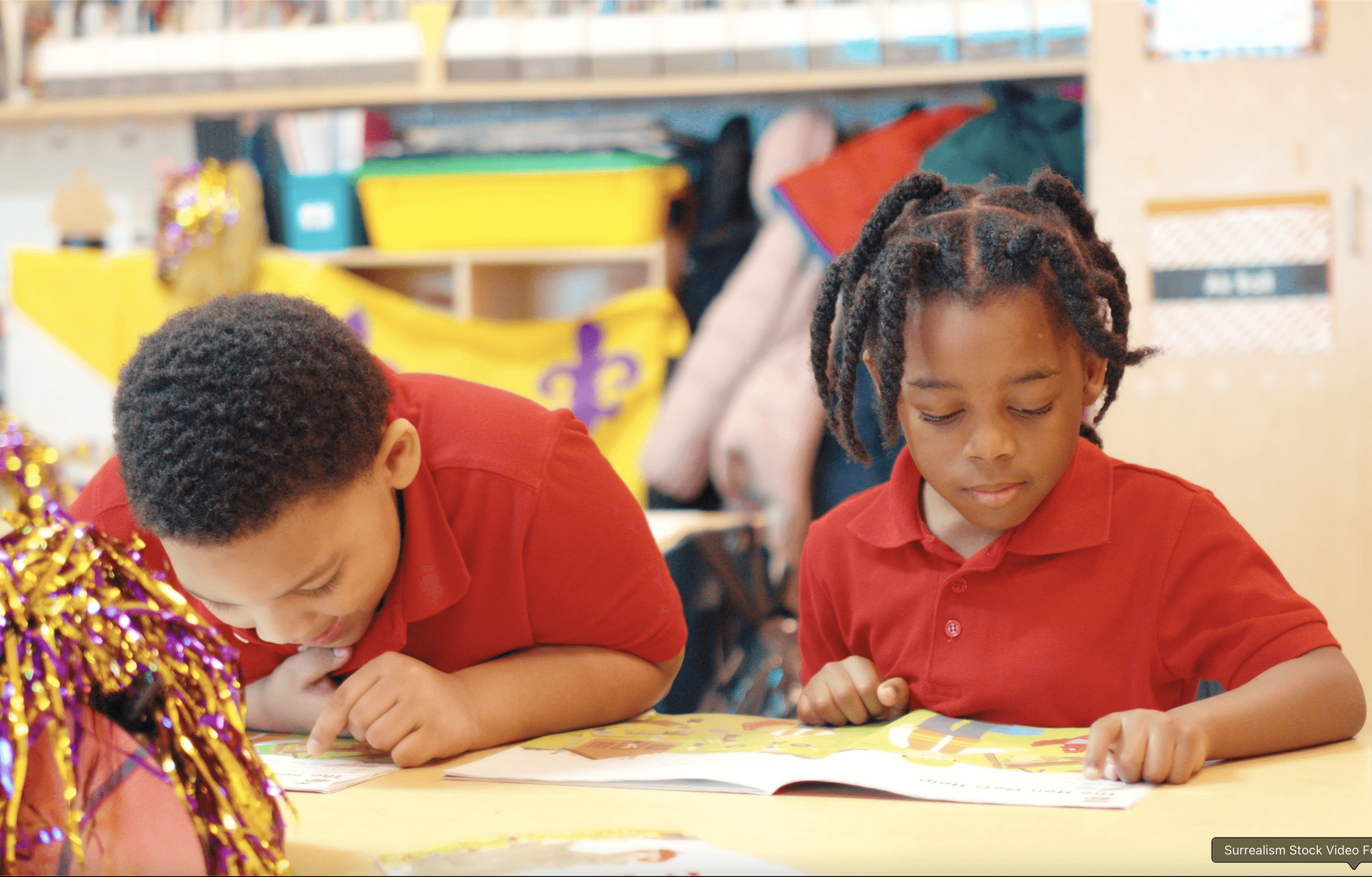 Emma Rivera & Lily Martinez are posing at seaside on stone