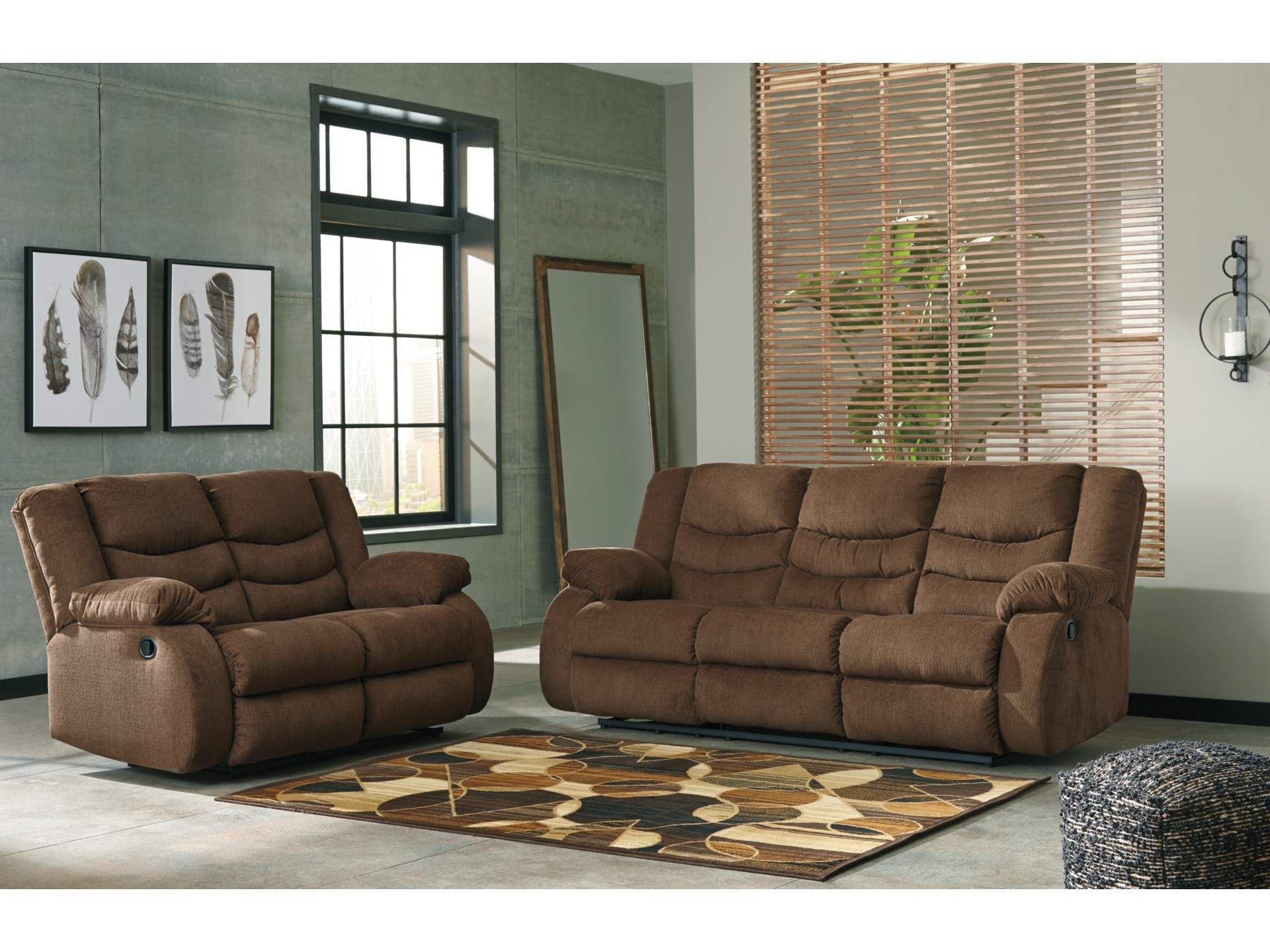 "Side view of Tulen Reclining Sofa showcasing its reclining feature"