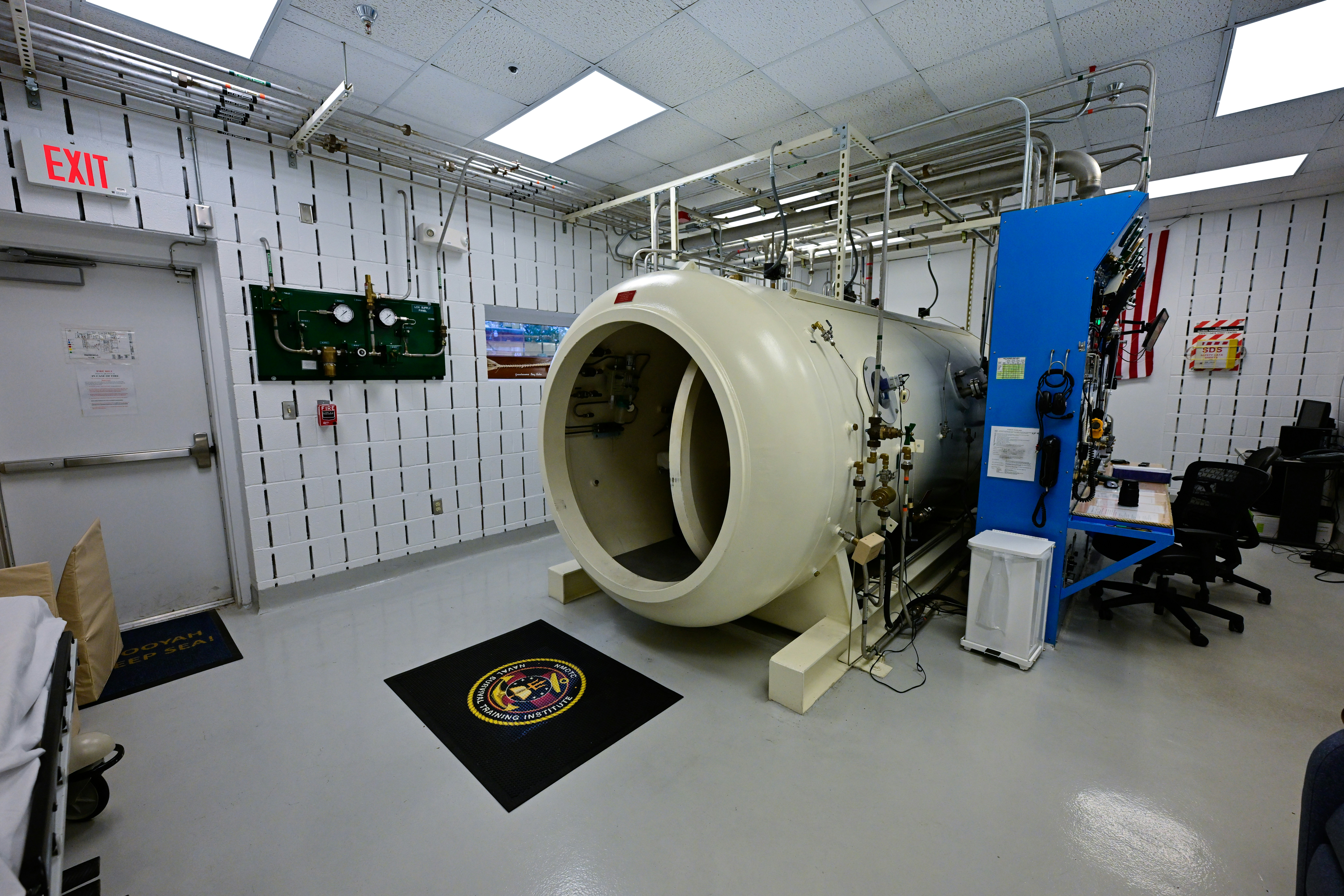 Large hyperbaric chamber in a medical room.