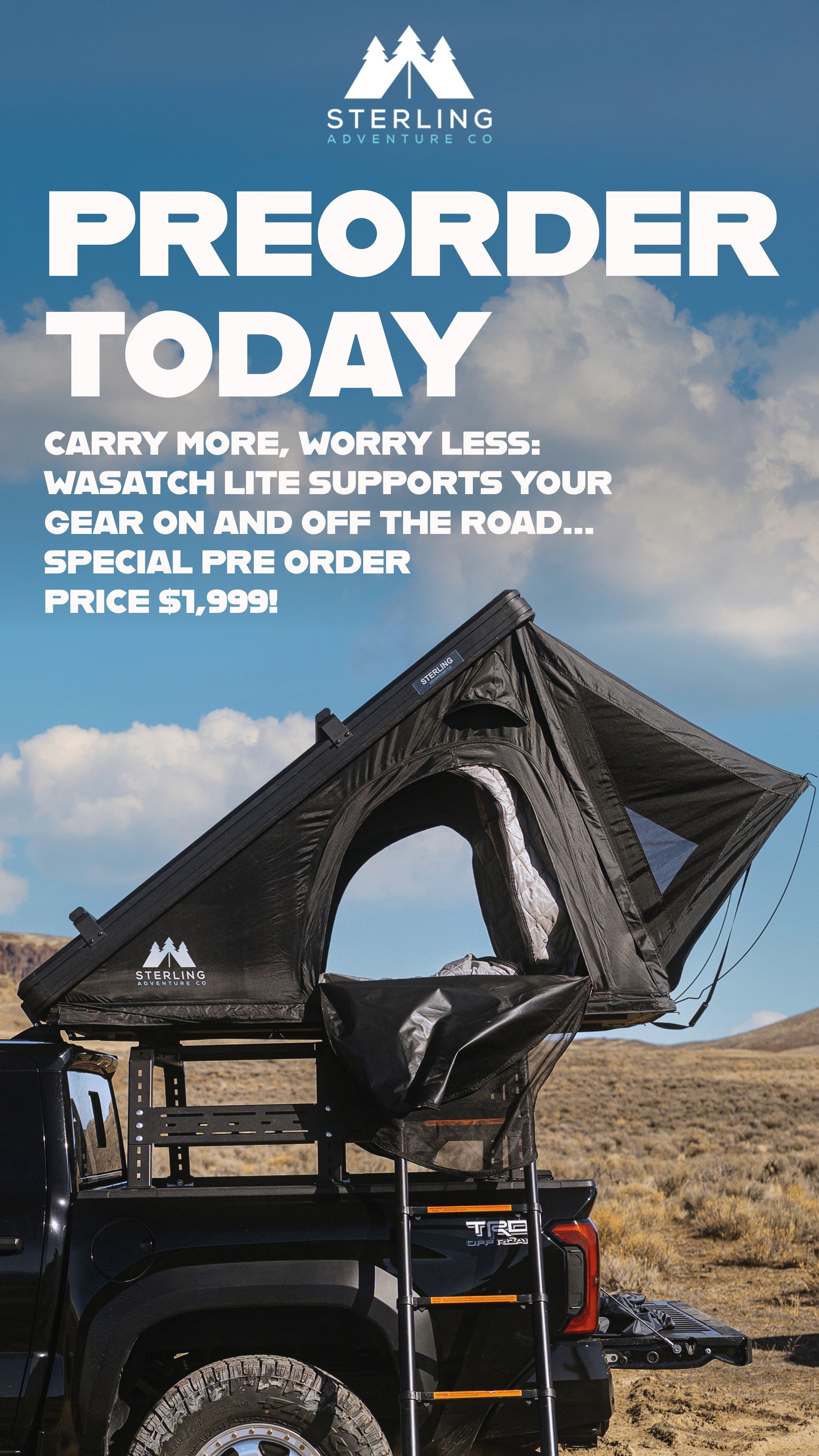 Black and white photo of two people looking at a computer screen with papers on wall