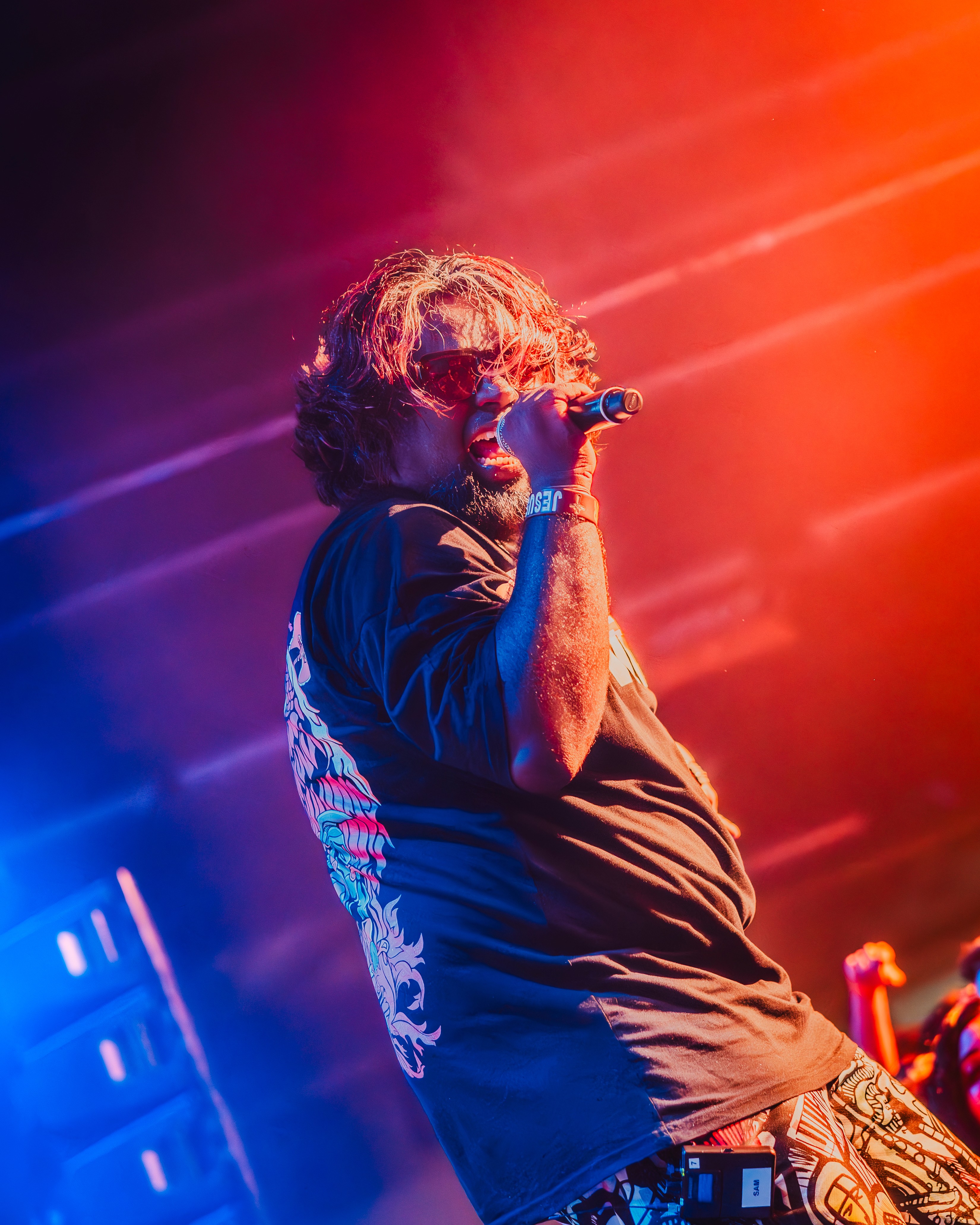 Warm string lights glow against a twilight sky.