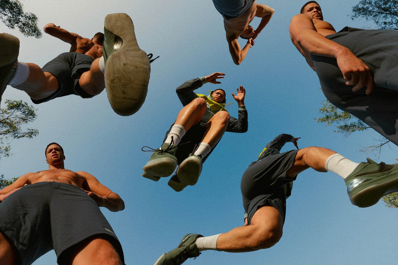 bottom eye level view of people jumping