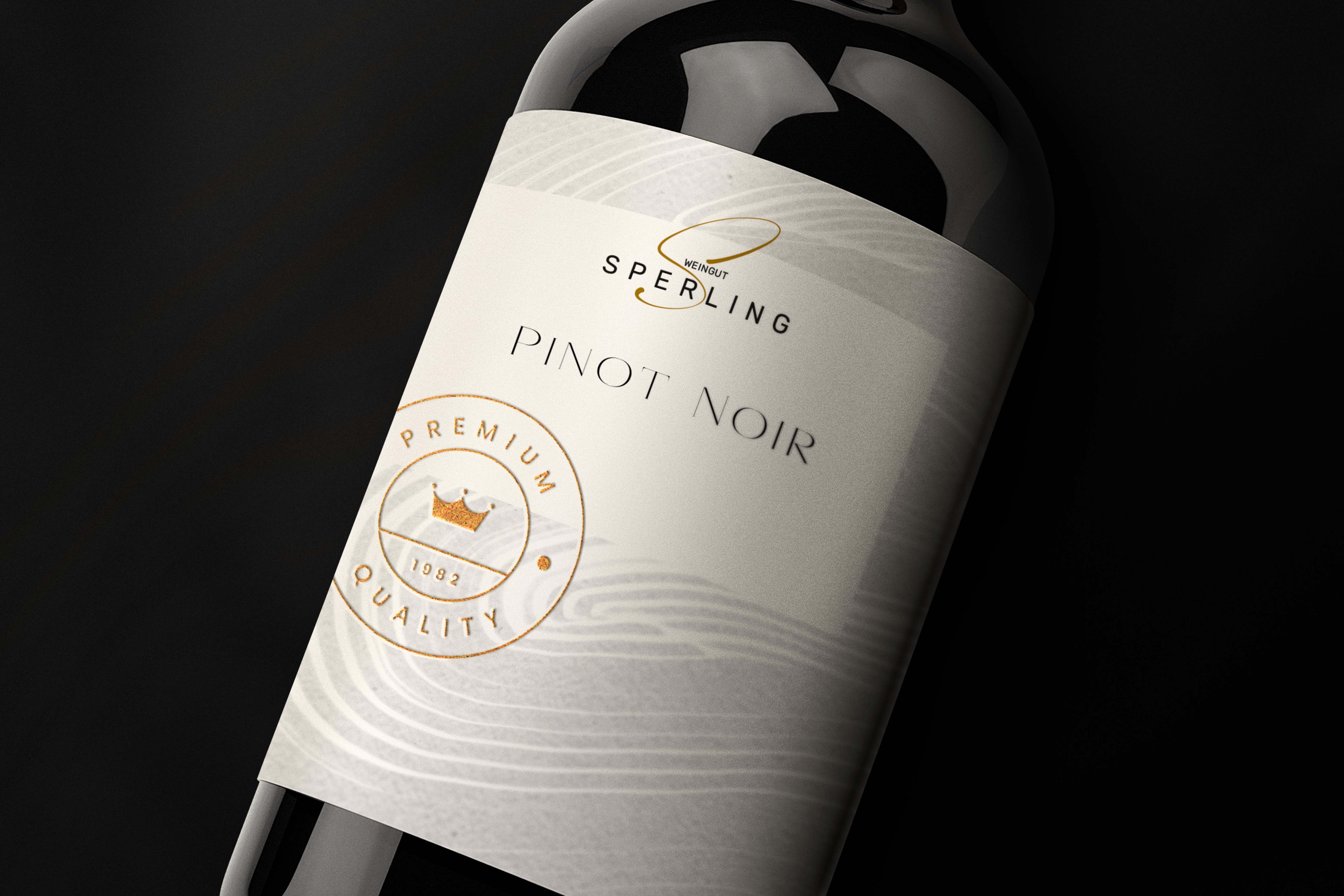 hand holding meadow flowers on a dark green background