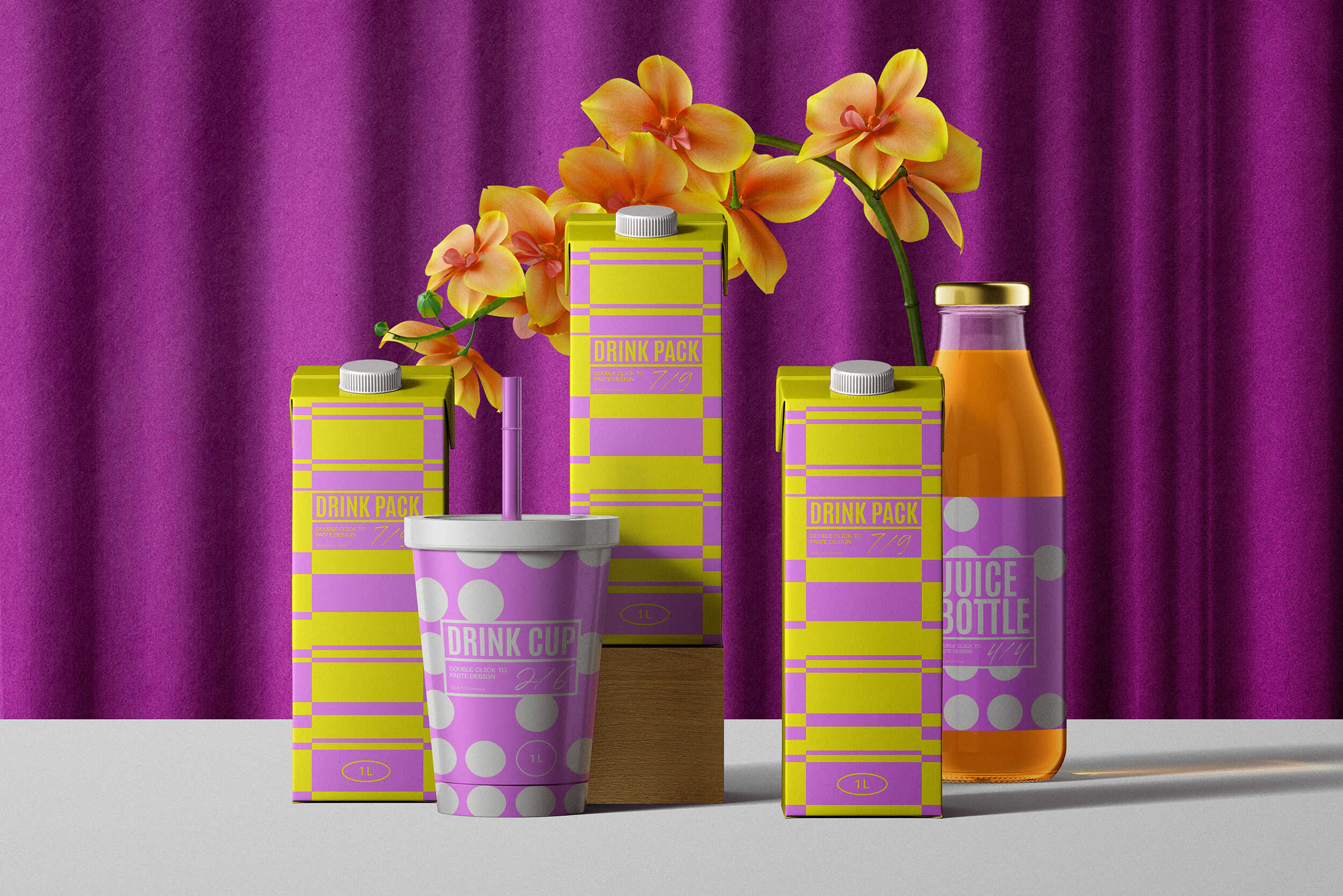 Drink cartons and juice bottle styled with bold yellow and lavender patterns in front of purple curtain