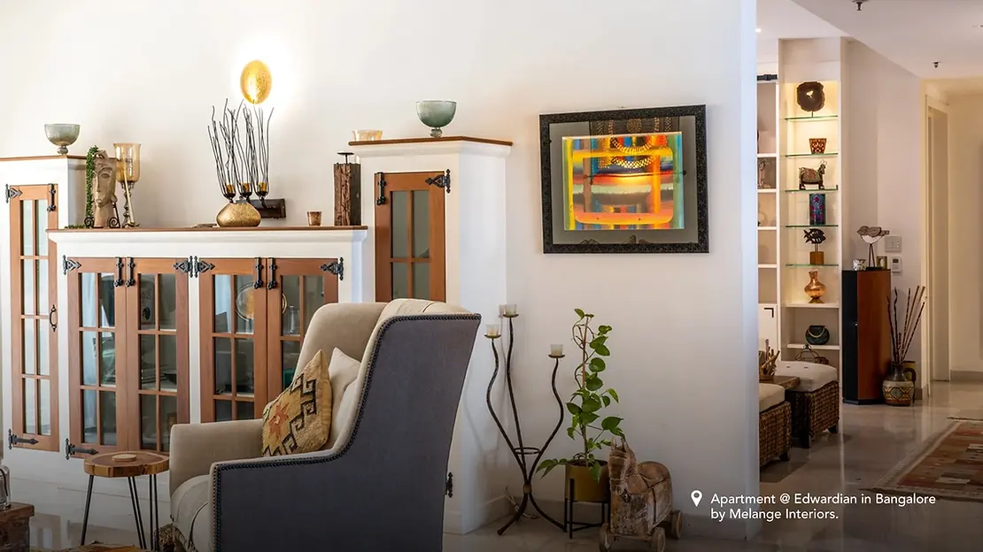 A living room with traditional and ethnic interior design patterns.