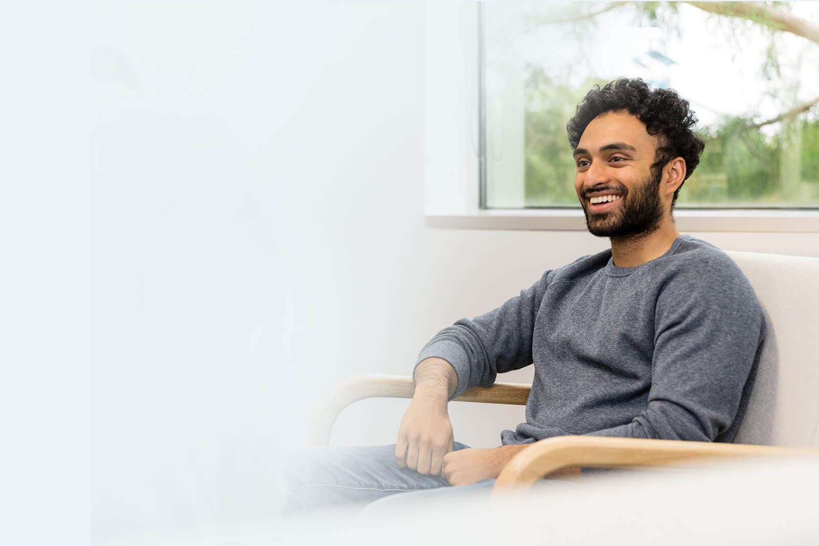 smiling man in doctor's office