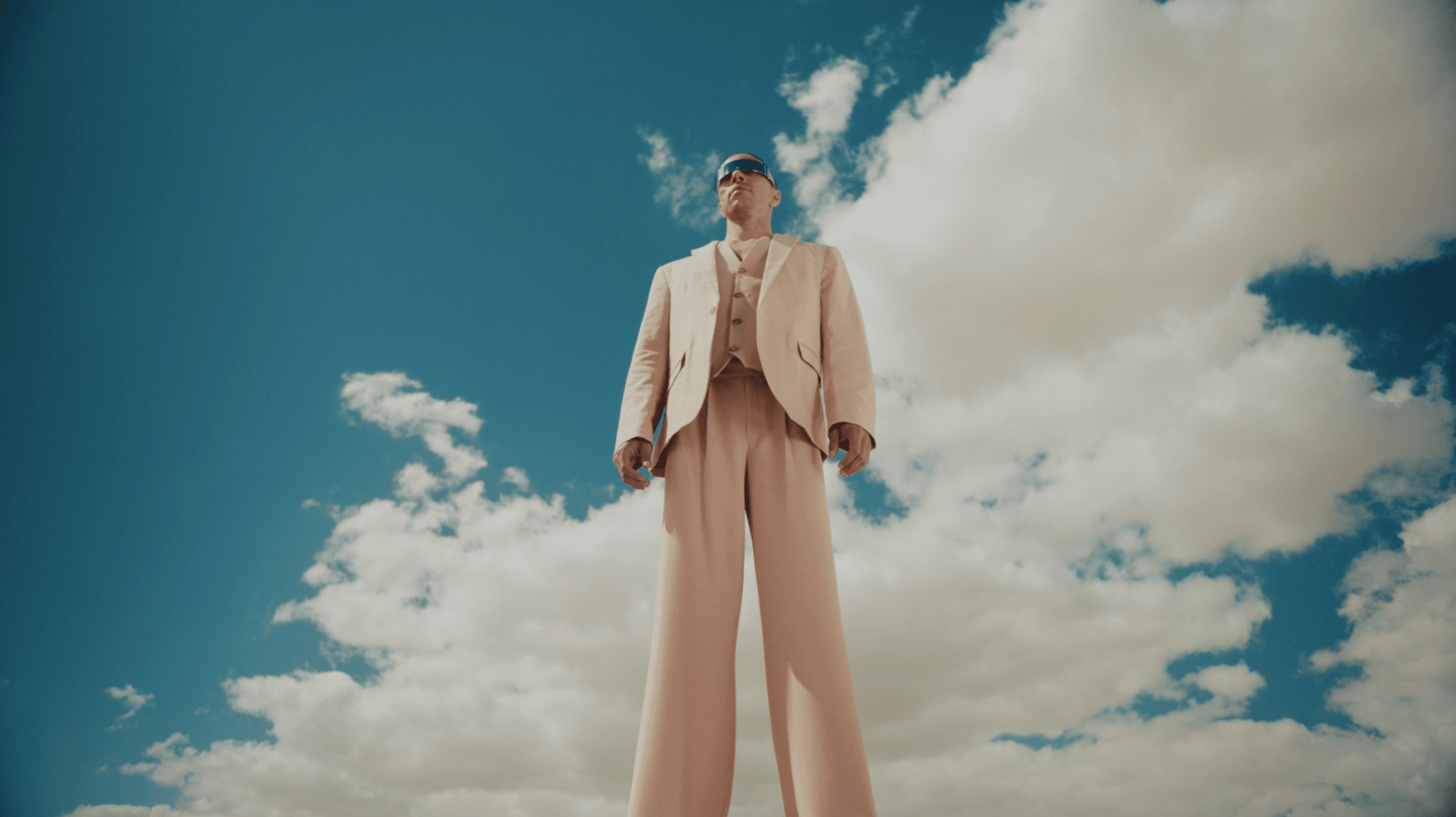 white robot near brown wall