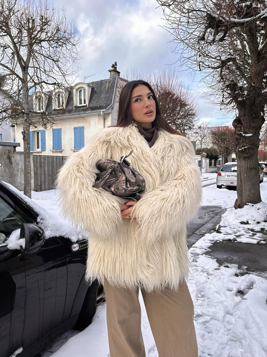 woman with a white winter coat