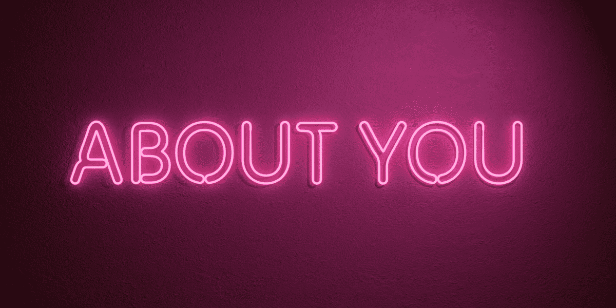 Neon sign saying ABOUT YOU