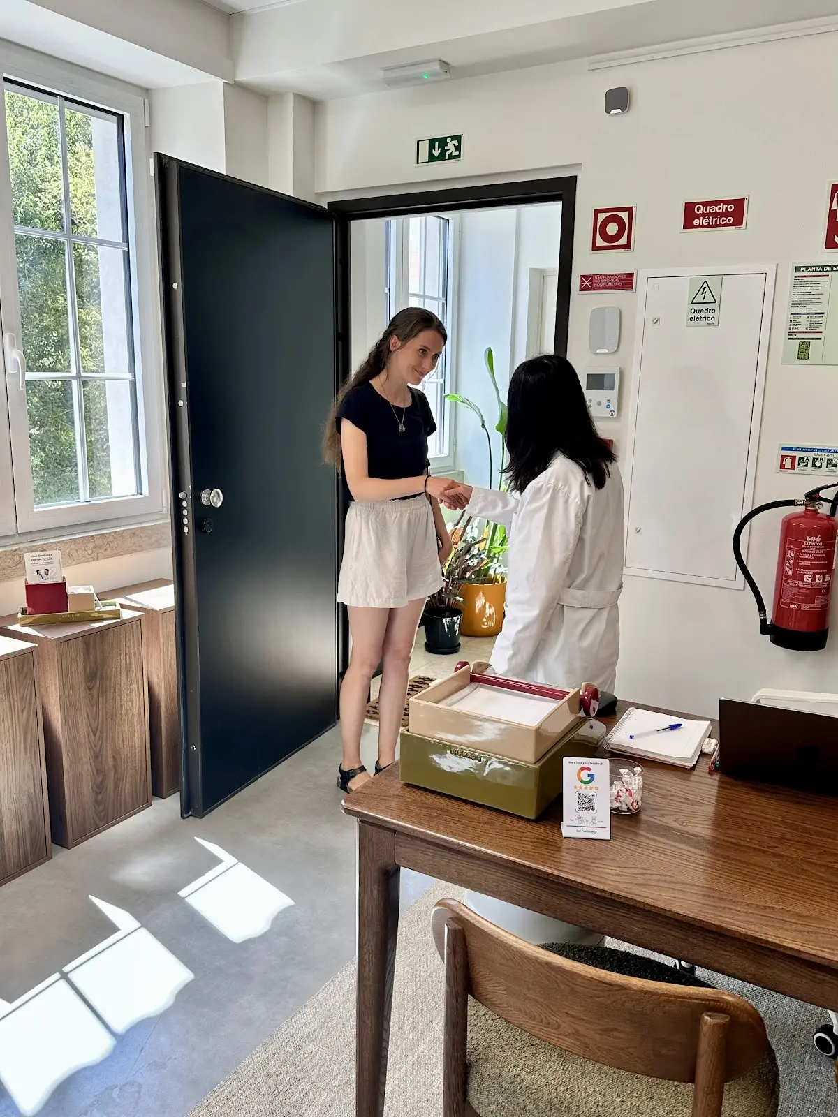 A TejoMed doctor welcoming a member at the clinic