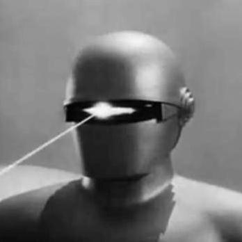 Portrait image of Gort with a laser blast emitting from its eye panel