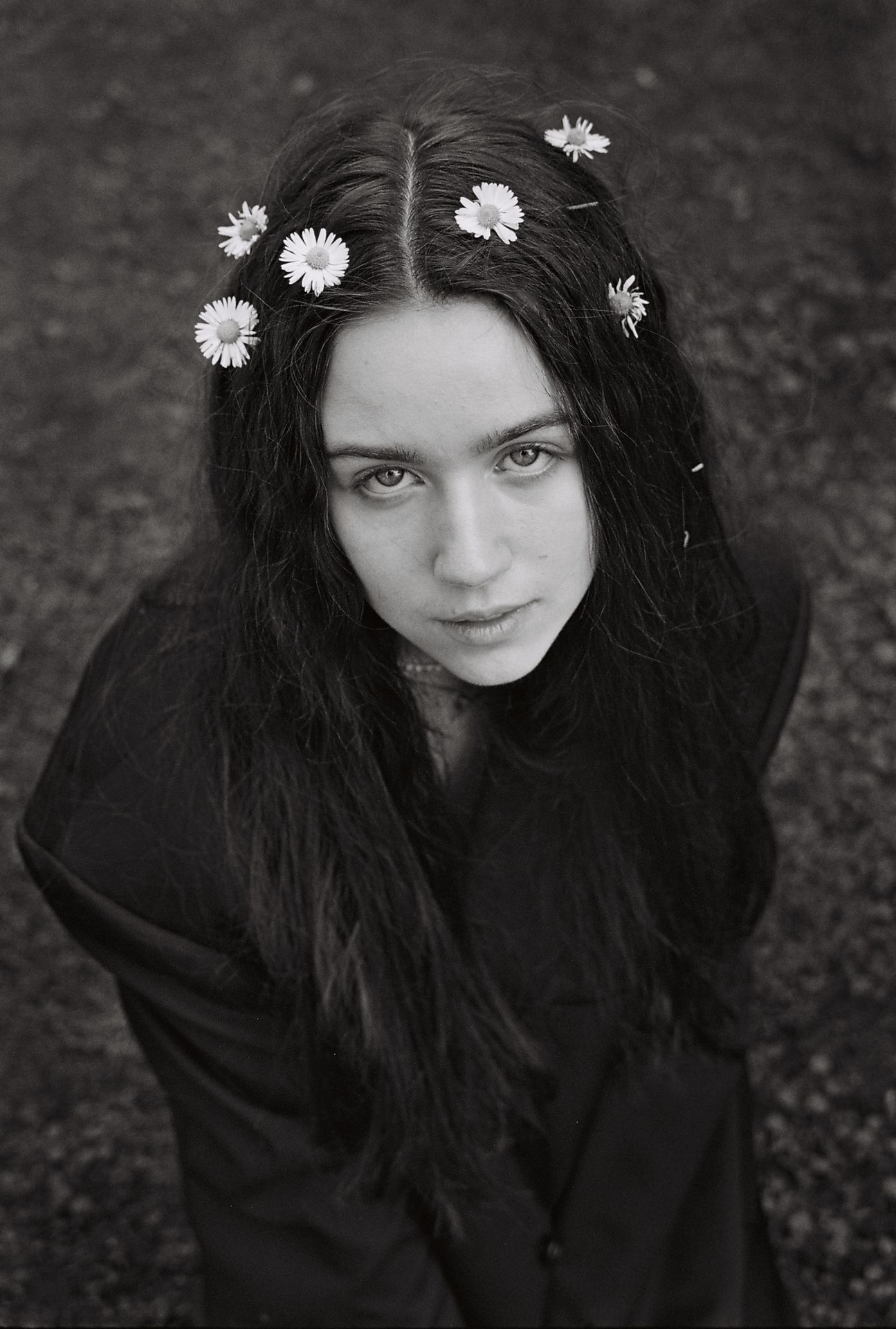 woman with floral elements in her hair