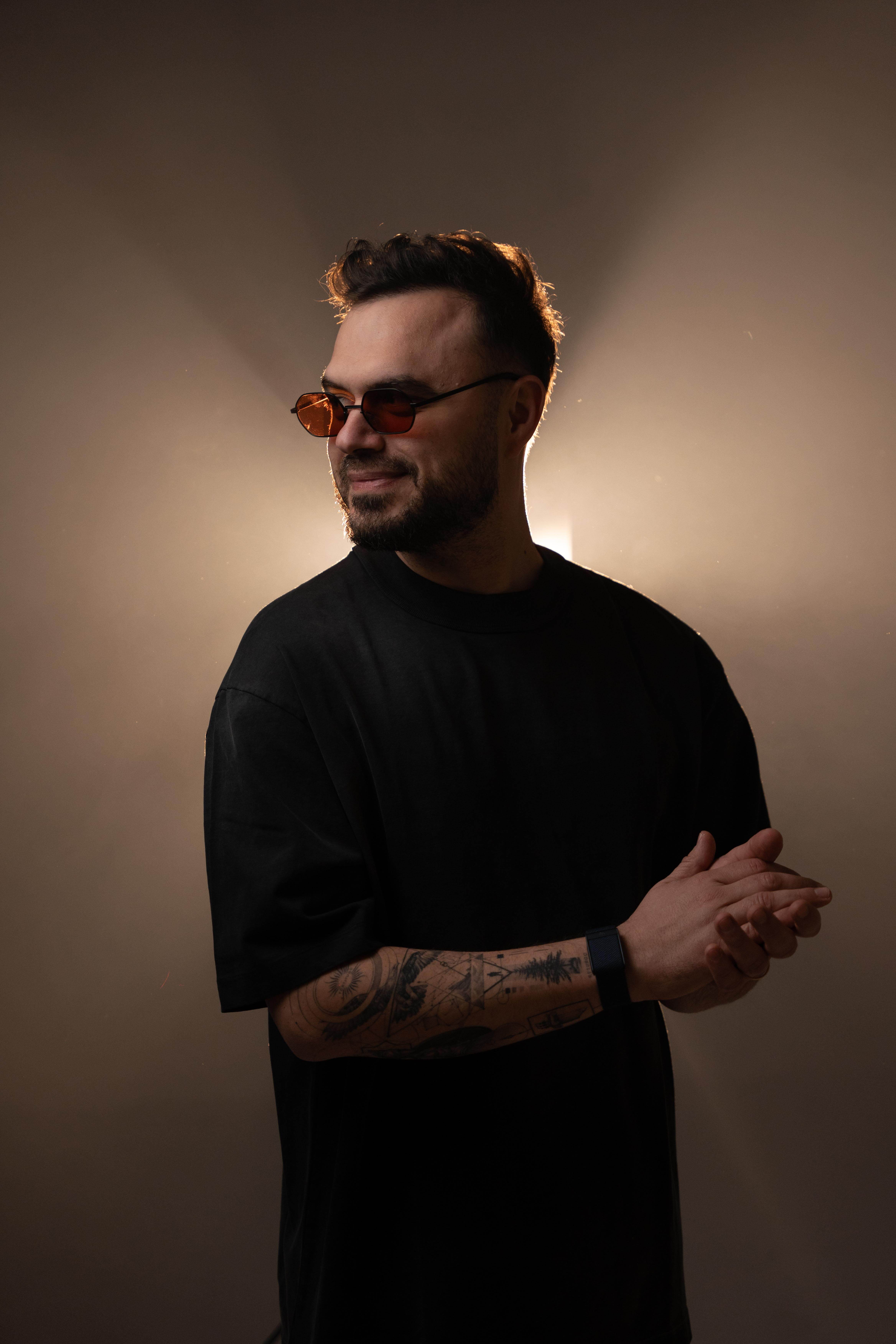 Music Producer sitting at his desk