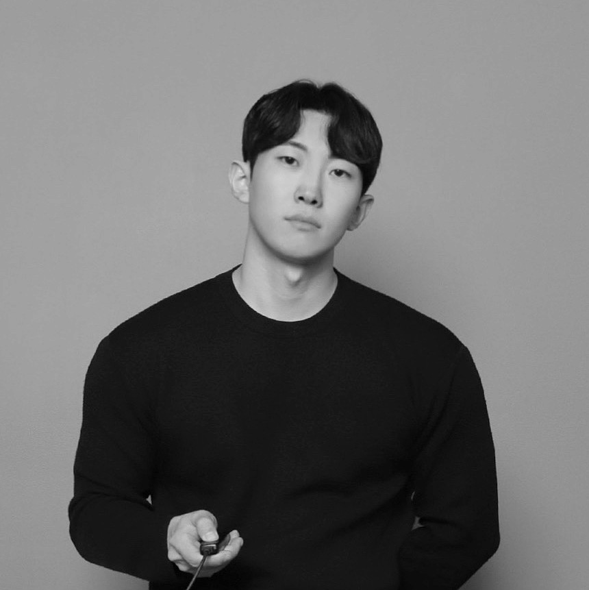 asian man in black and white photo