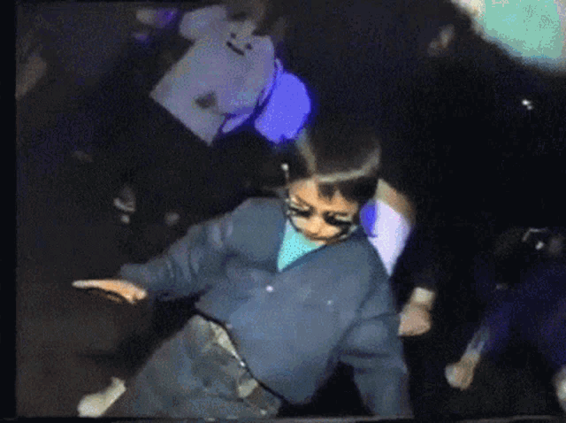 Happy Kid Dancing in a Club