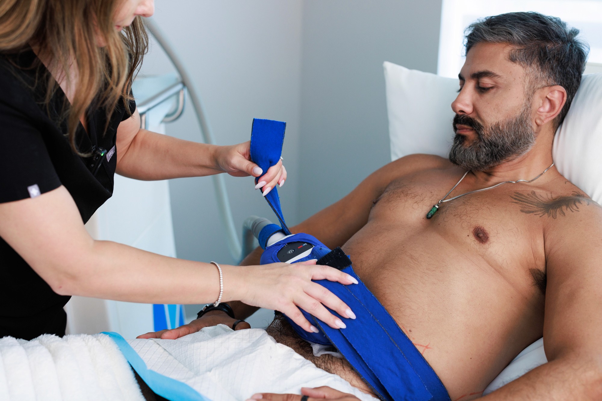 The beautician installs the applicator on a patient