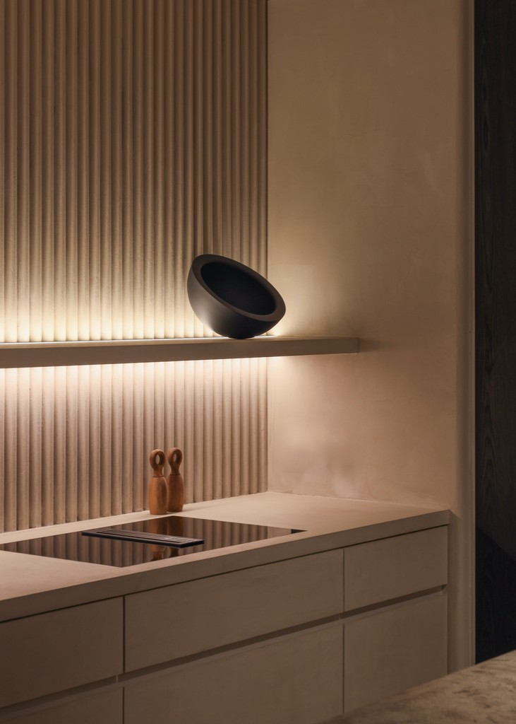 white ceramic sink beside window