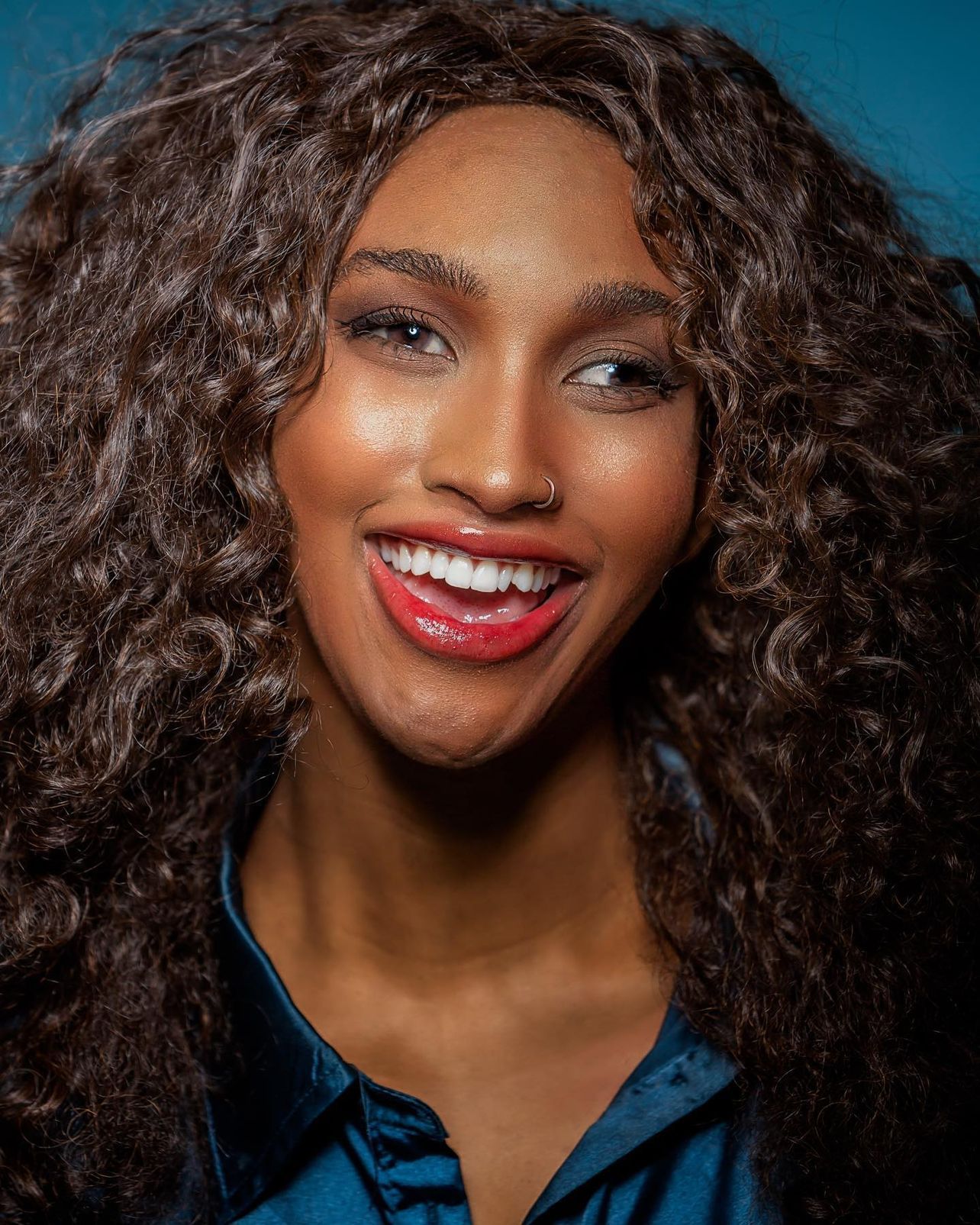 Headshot of Abi James Miller