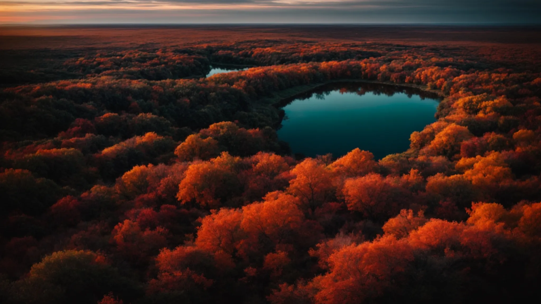 a sunset landscape, colors intensified and shadows deepened through photo editing, creating a dramatic and mesmerizing view.