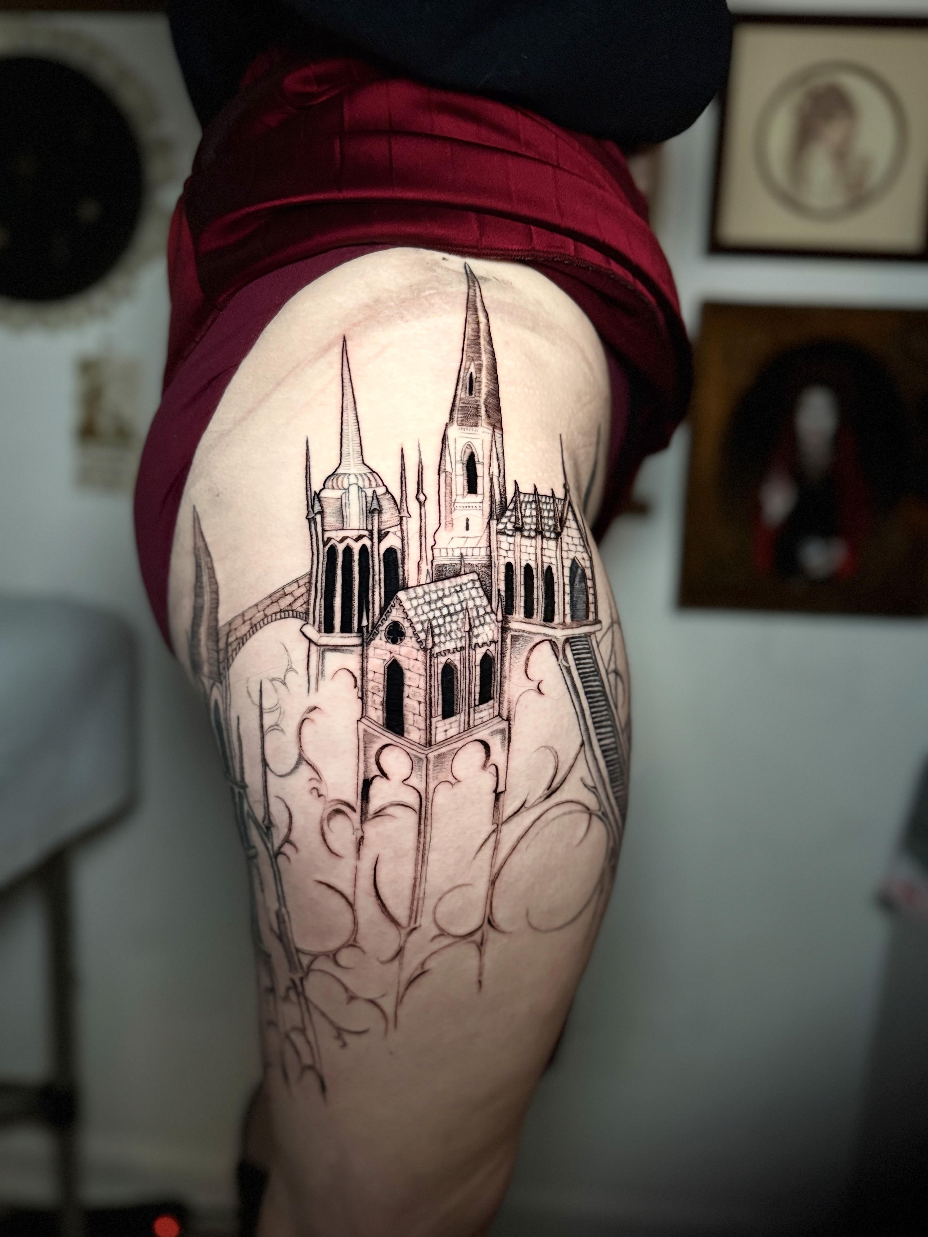 Black and grey tattoo on a leg depicting Alucard and Seras Victoria from the anime series Hellsing.