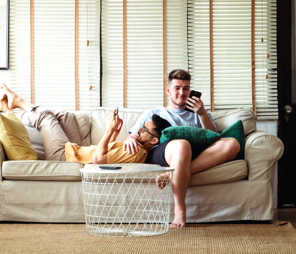 gay couple on sofa