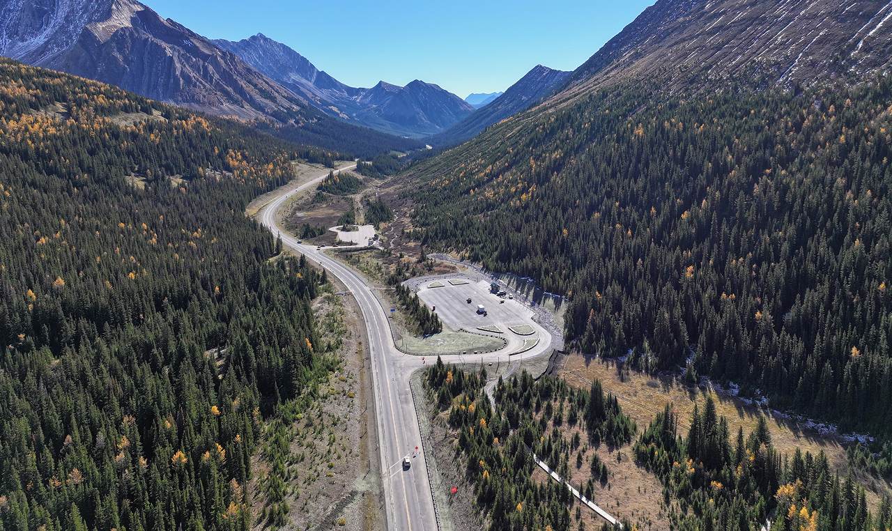 Aerial view of expanded Highwood Meadows parking lot along Highway 40 in mountain pass