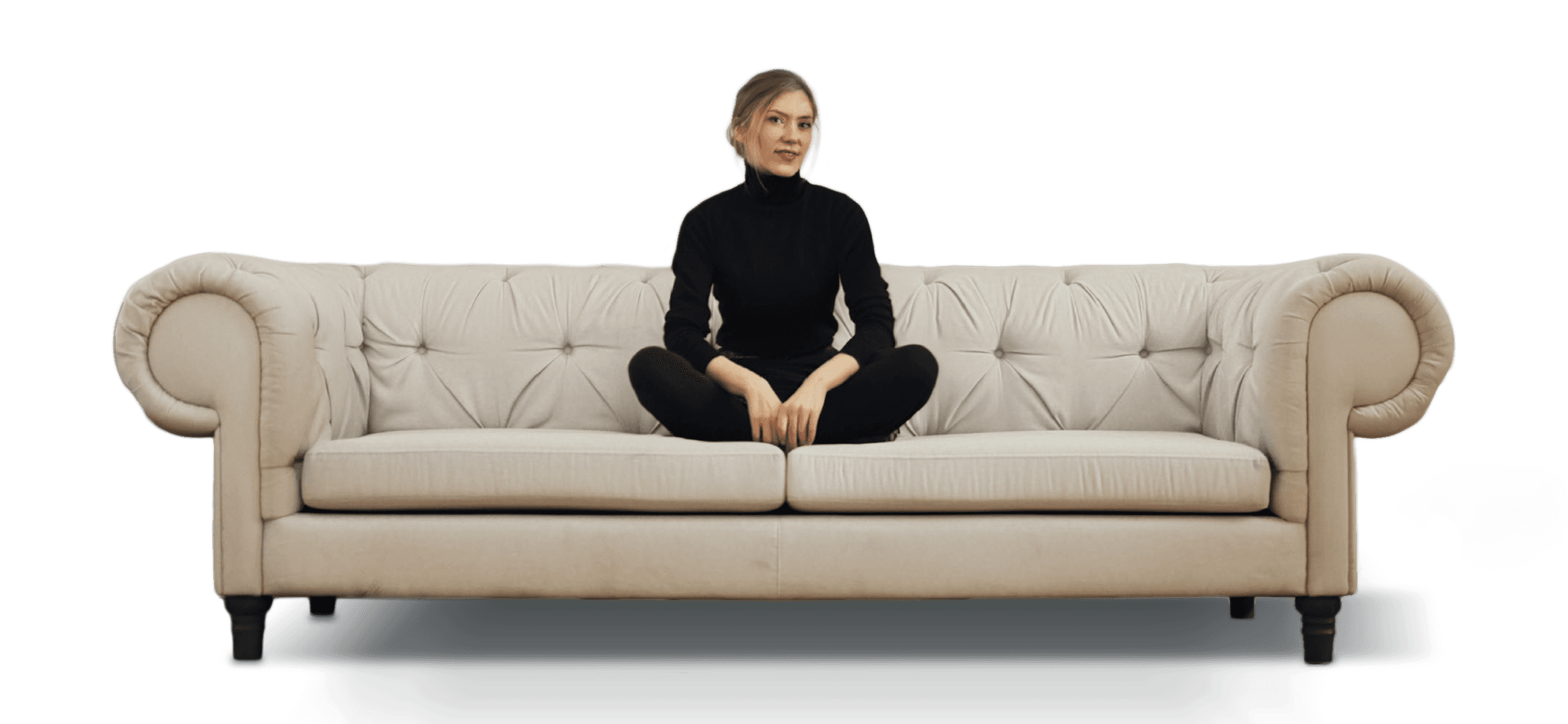 Woman sitting on couch.