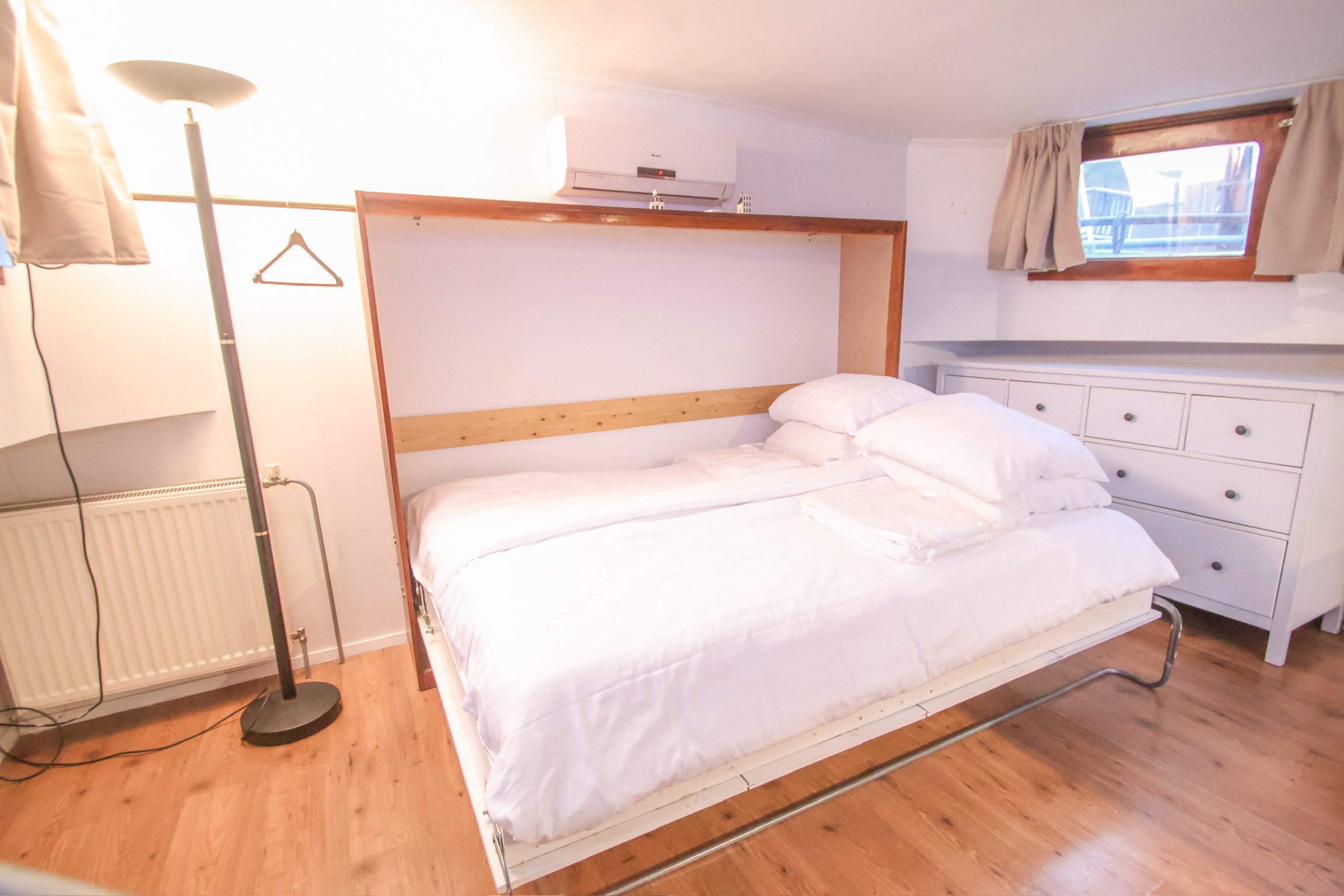 Modern kitchen island with bar chairs