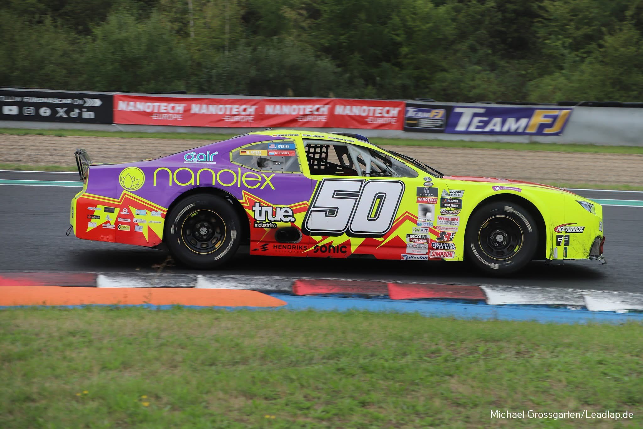 Side action shot of Car Number 50 at Autodrom Most