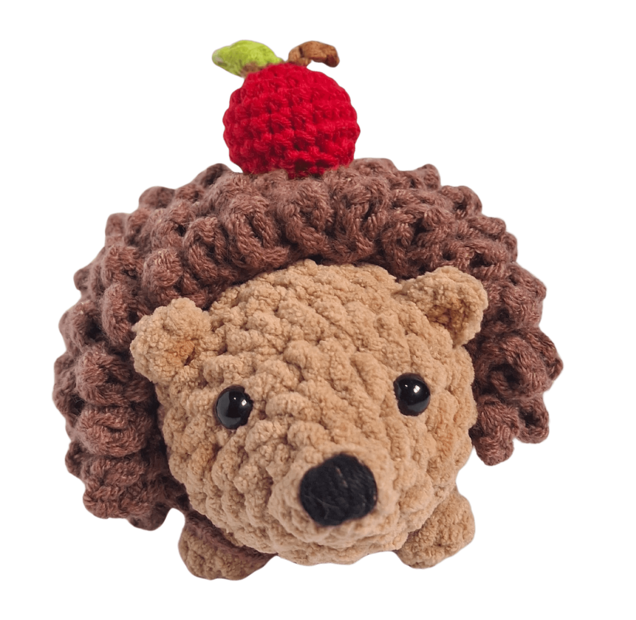 A cute, handcrafted plush hedgehog toy with brown yarn spikes and large, friendly eyes sits facing forward on a white background.