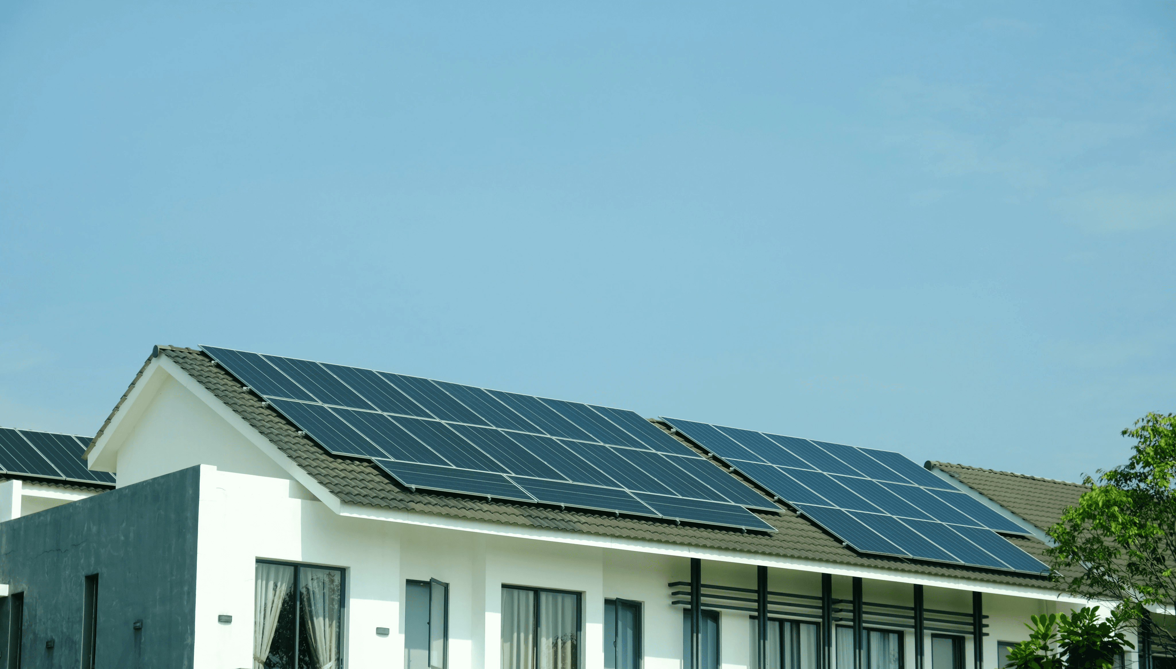 Cluster house with solar panels on the roof.