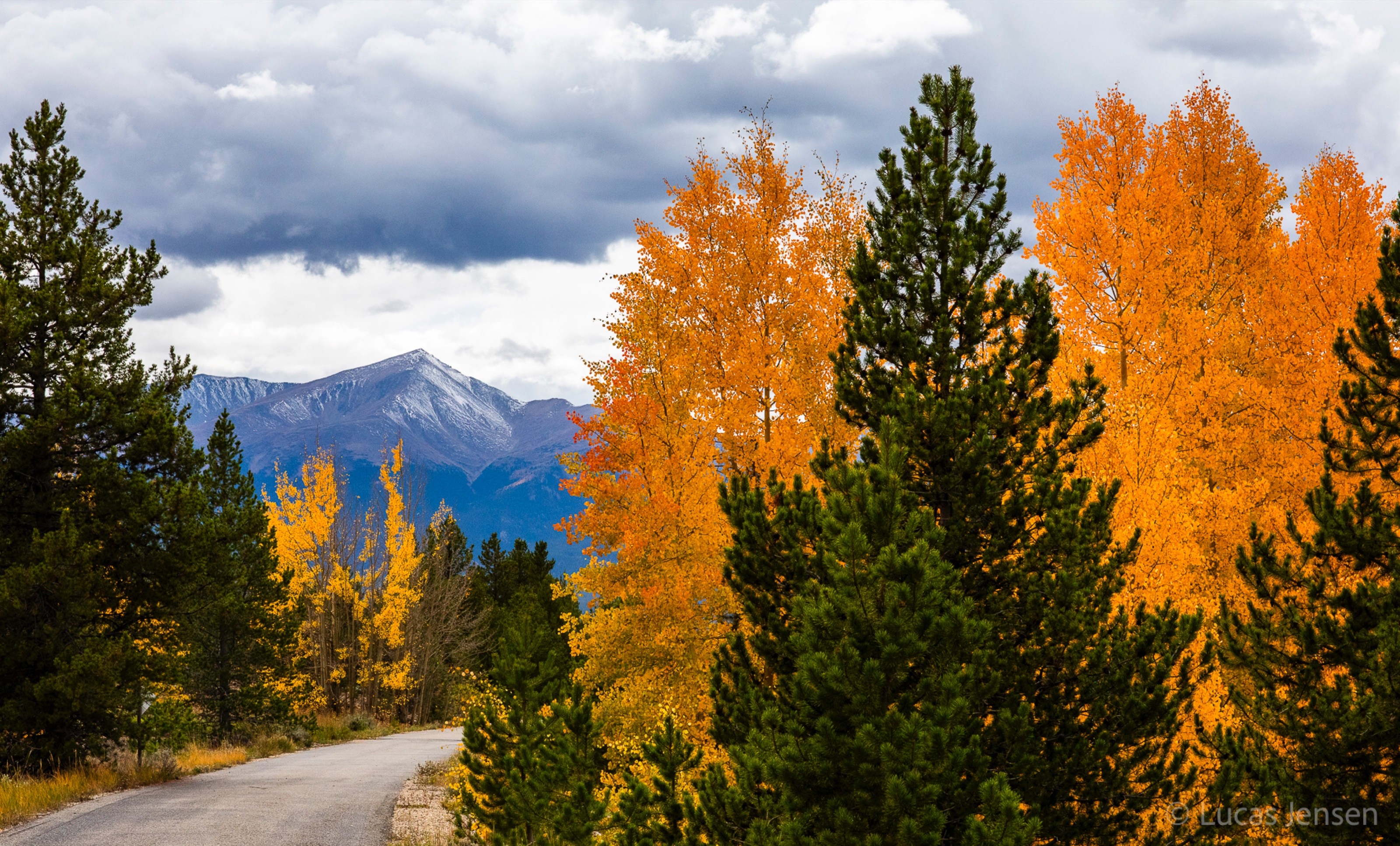 landscape photograph of mountains, water, desert, or coast by Lucas Jensen