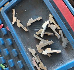 Ignition lock wafers and internal parts replaced during ignition repair by CarKeyAction