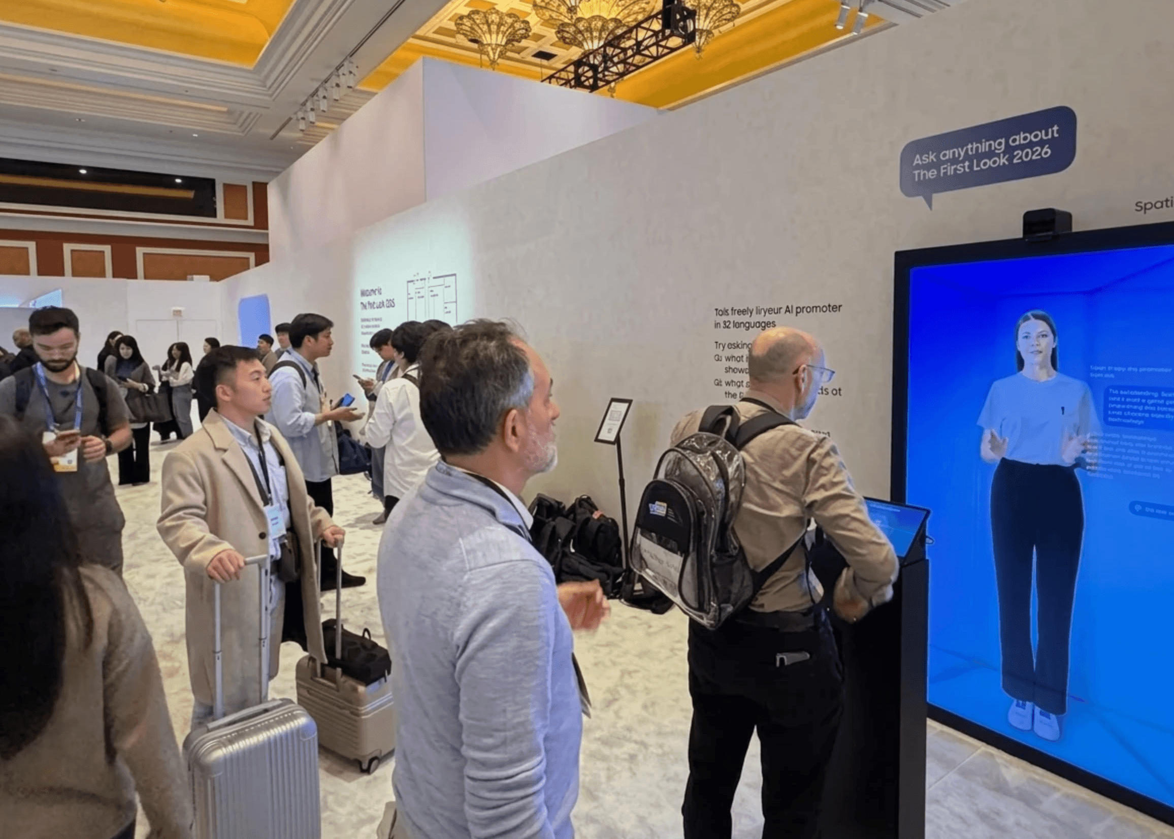 Man sitting against blue wall.