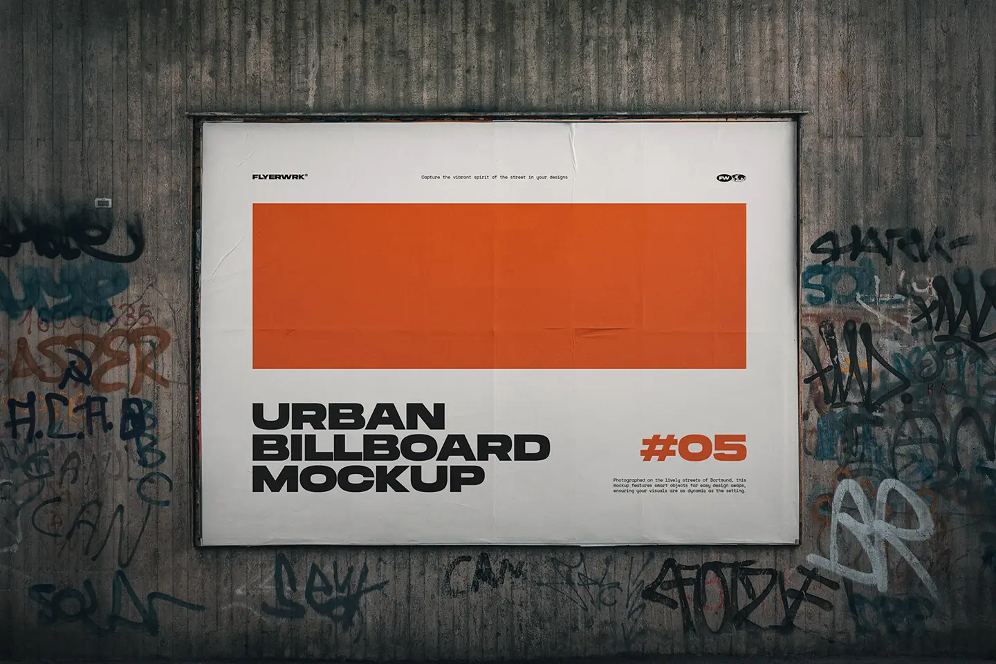 Urban billboard mockup on graffiti covered concrete wall captured in daylight