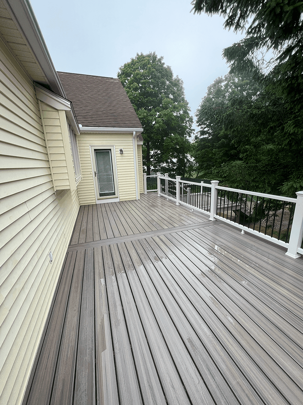 Grey Trex decking with white railings