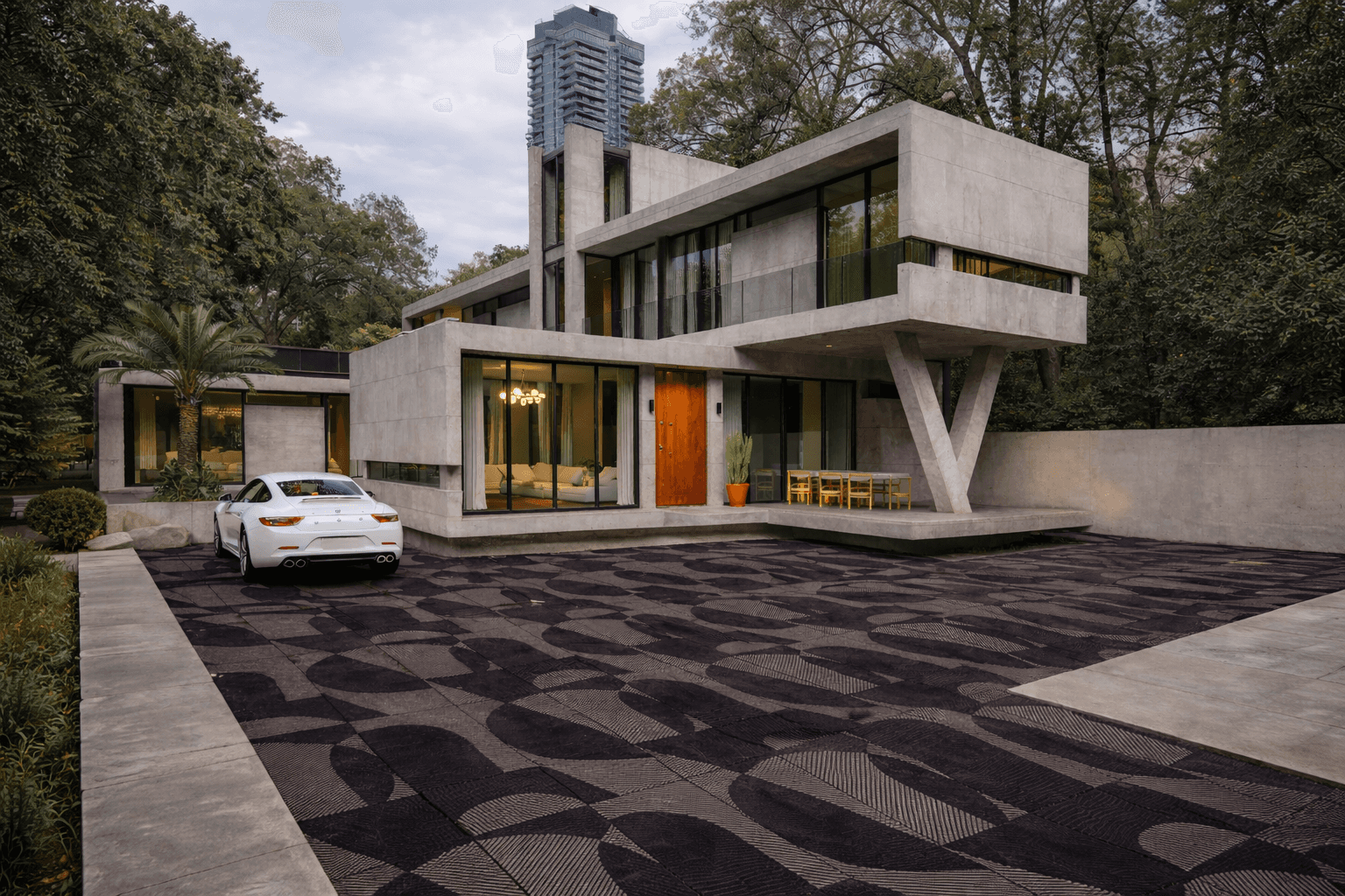 Moderna stone flooring used in contemporary residential driveway with artistic geometric paving design
