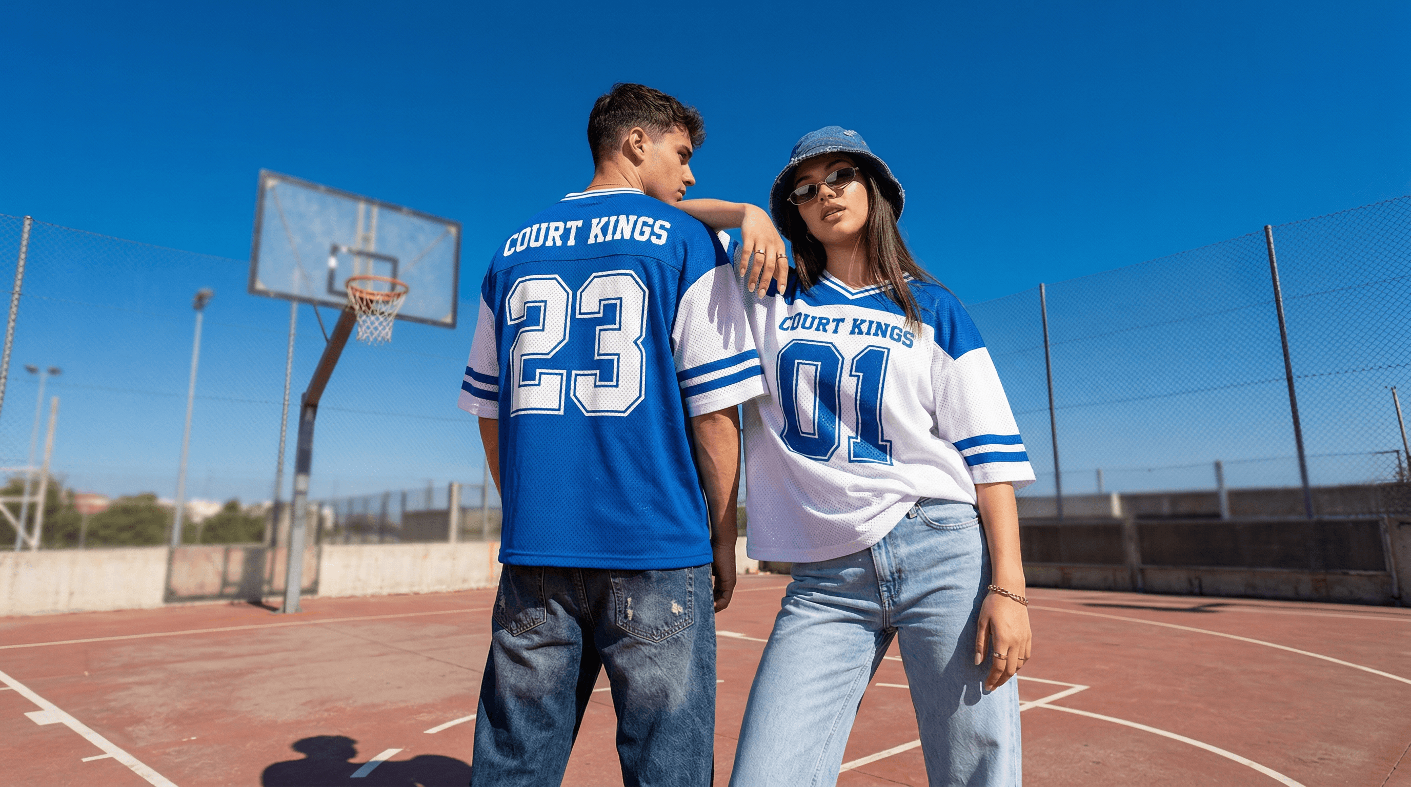 woman in red tank top sitting on chair in front of table