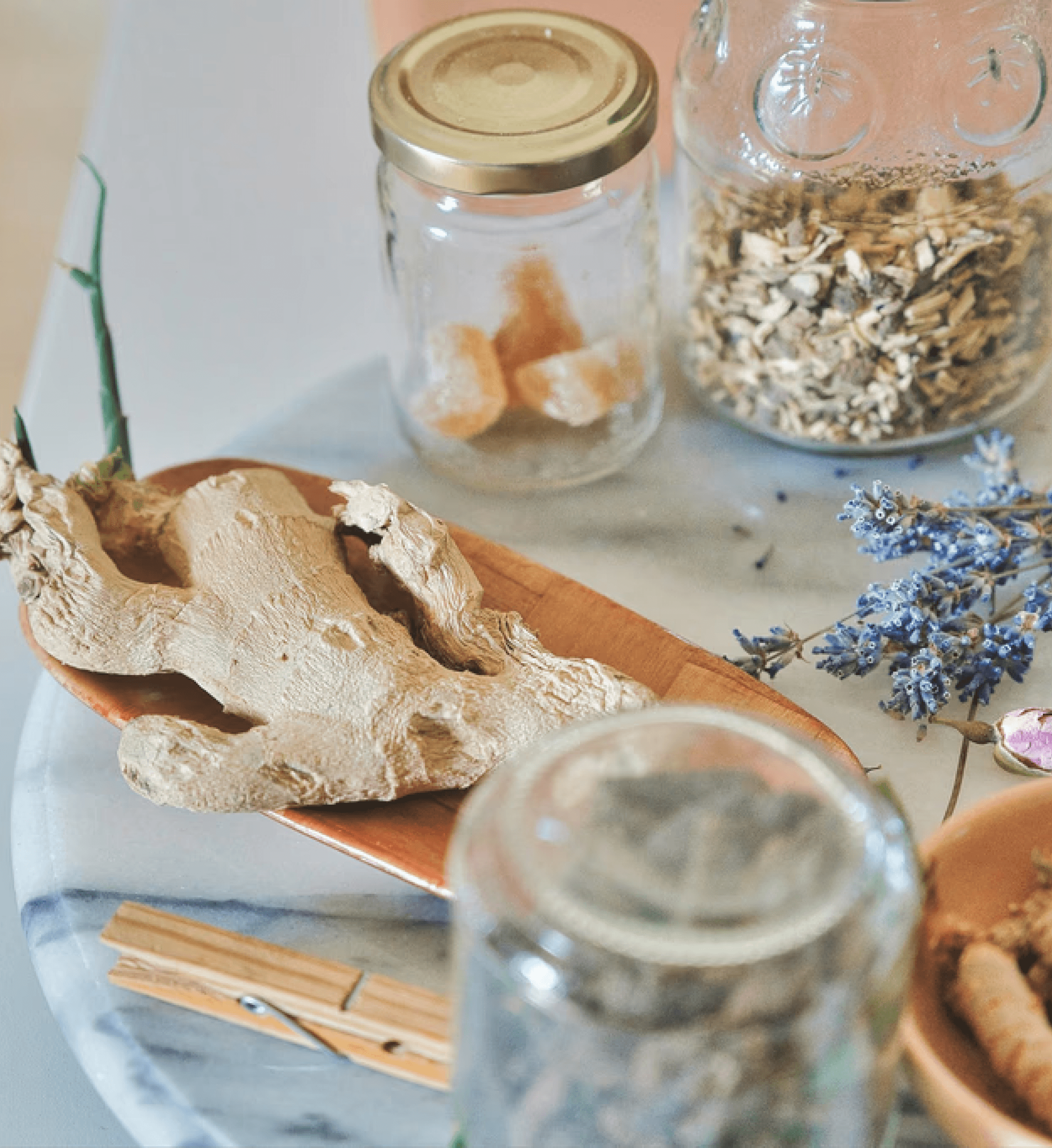 A beautifully set table with elegant glassware and assorted food items artfully arranged on a light surface.