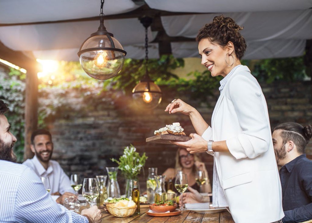 shaded-terrace-with-arched-ceilings-and-hanging-lamp