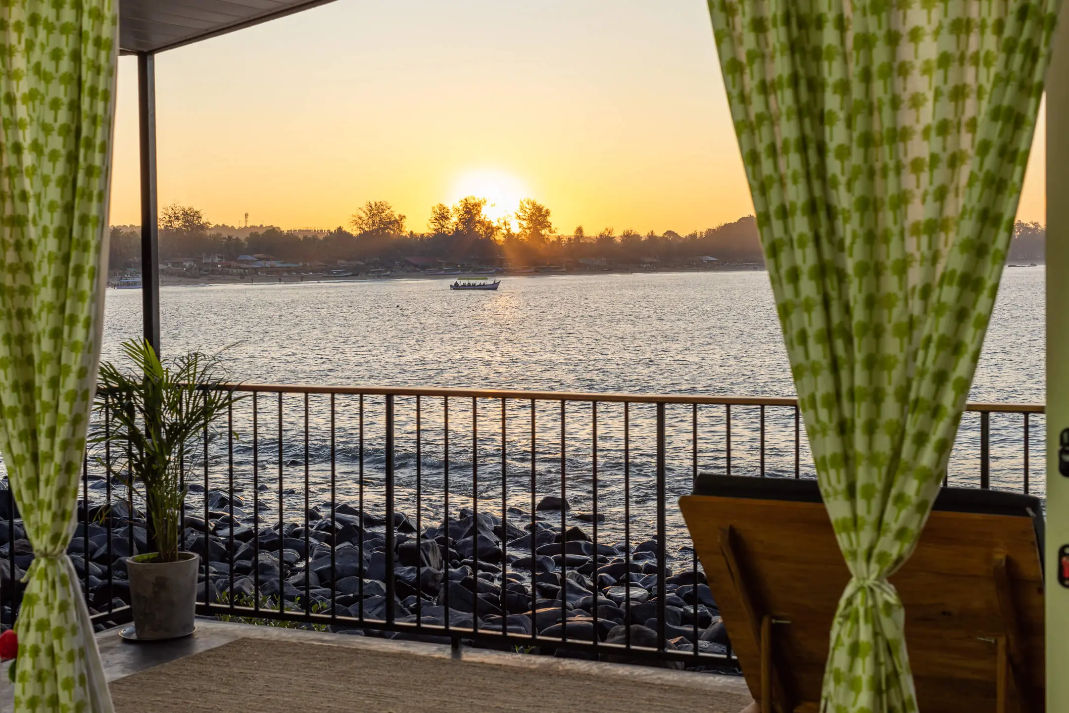 Grand Sea View Room 9 at Casa Jaali — sunset over the water