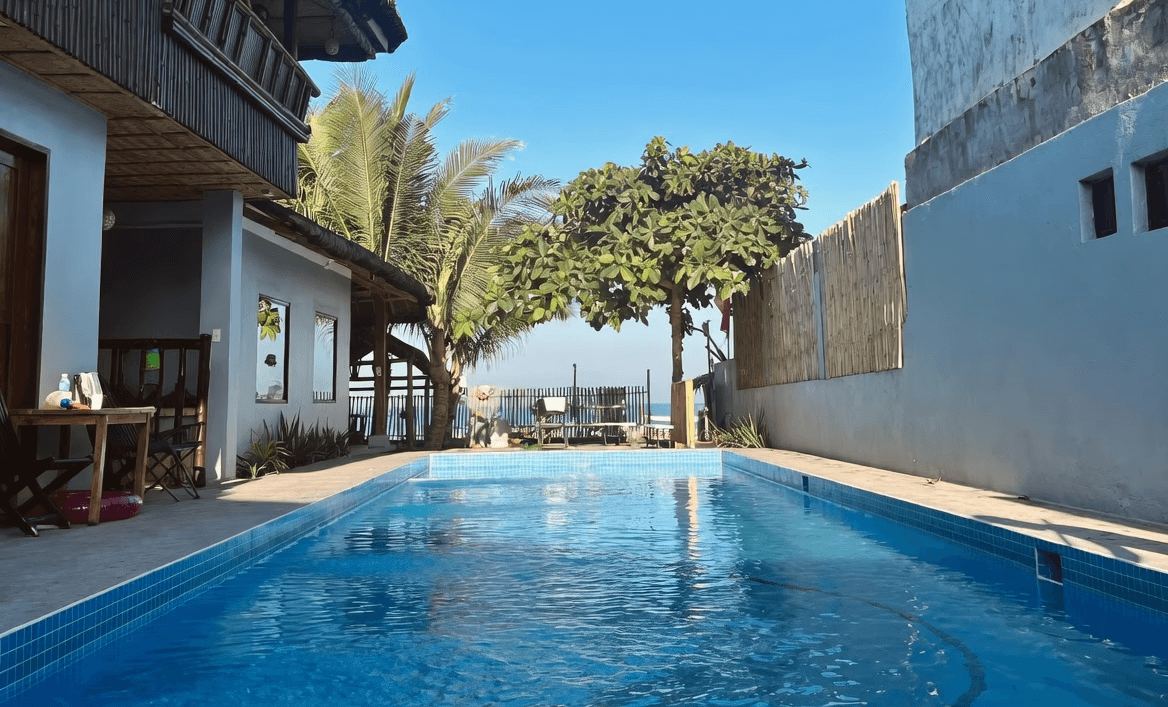 Long infinity pool overlooking the ocean at Oktowaves Hotel Nasugbu