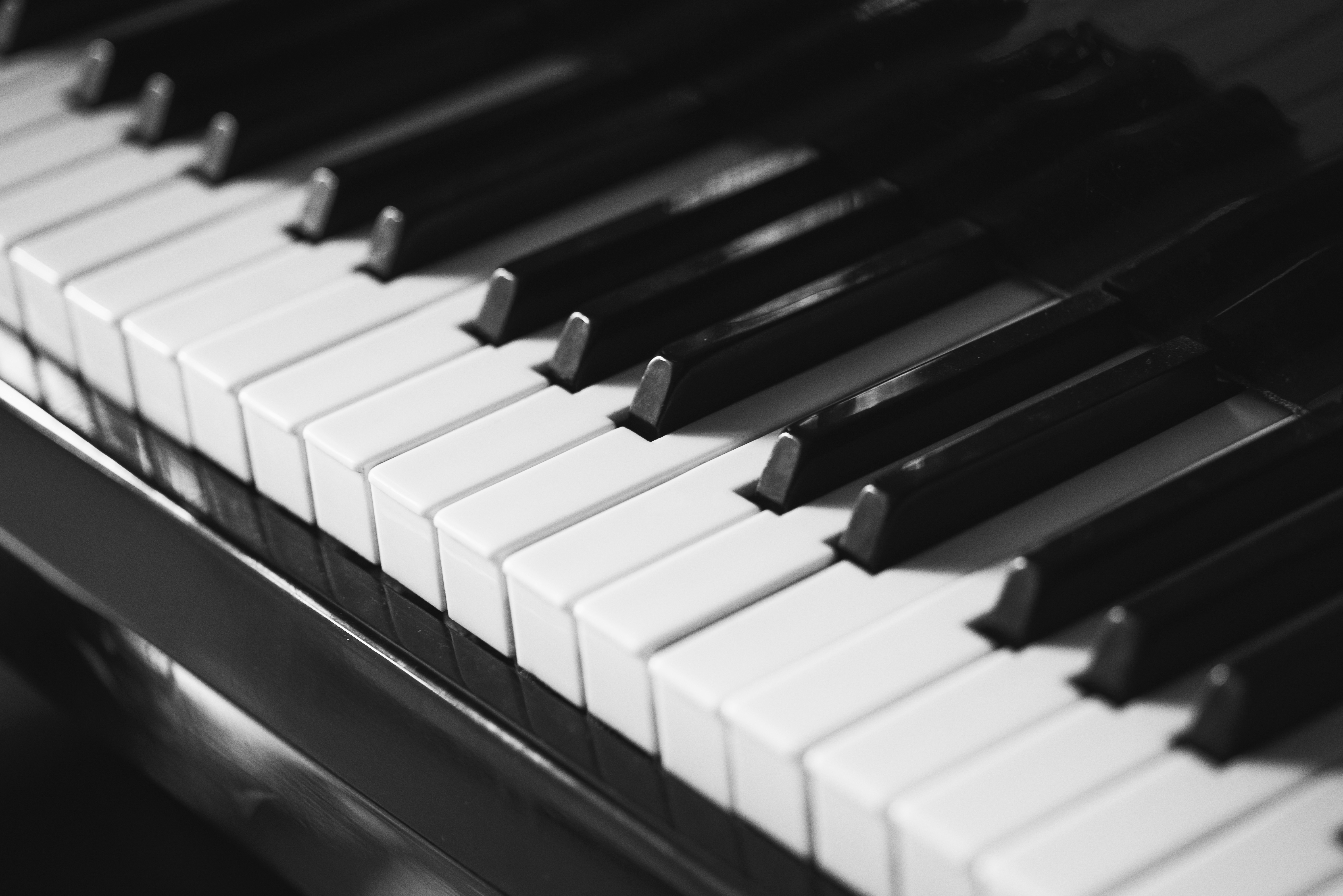 A close up photograph of a piano