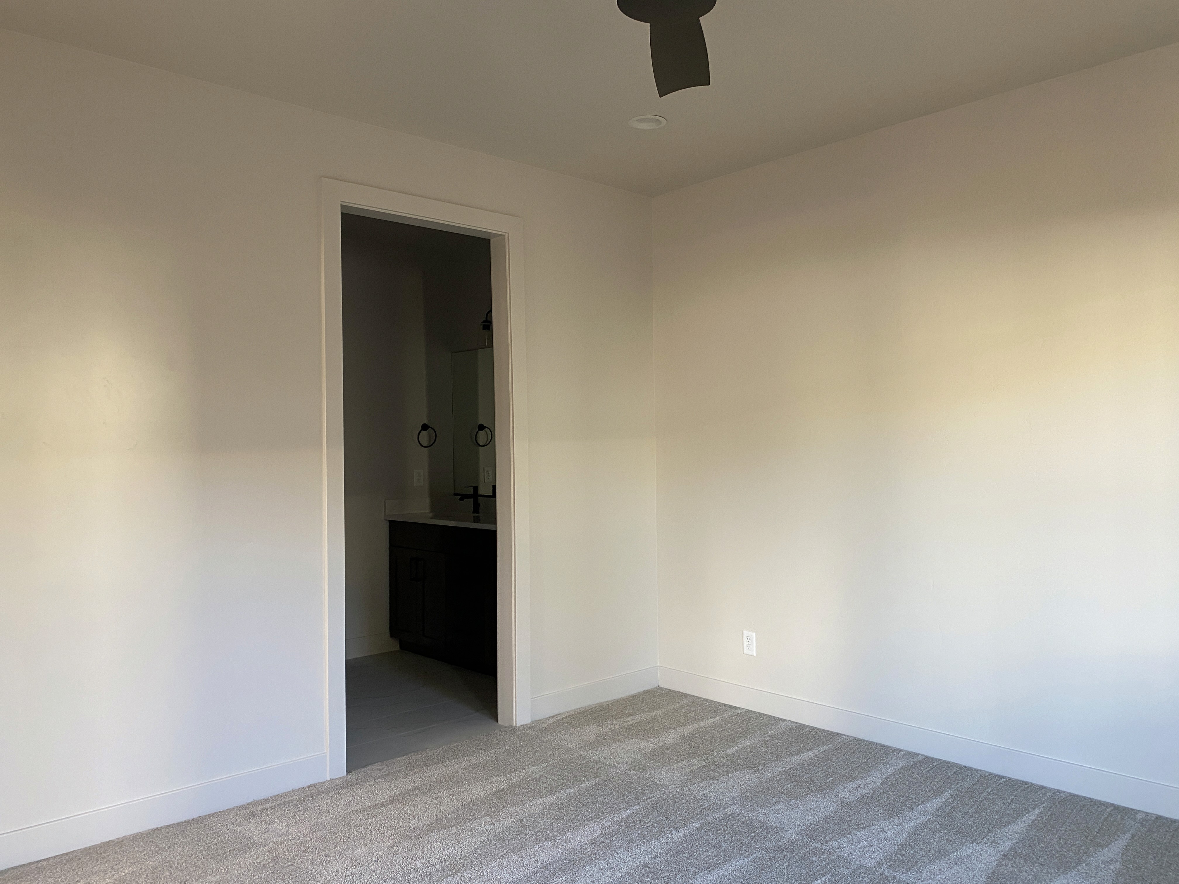 Bedroom in a Hurricane, Utah duplex with natural light and comfortable layout.