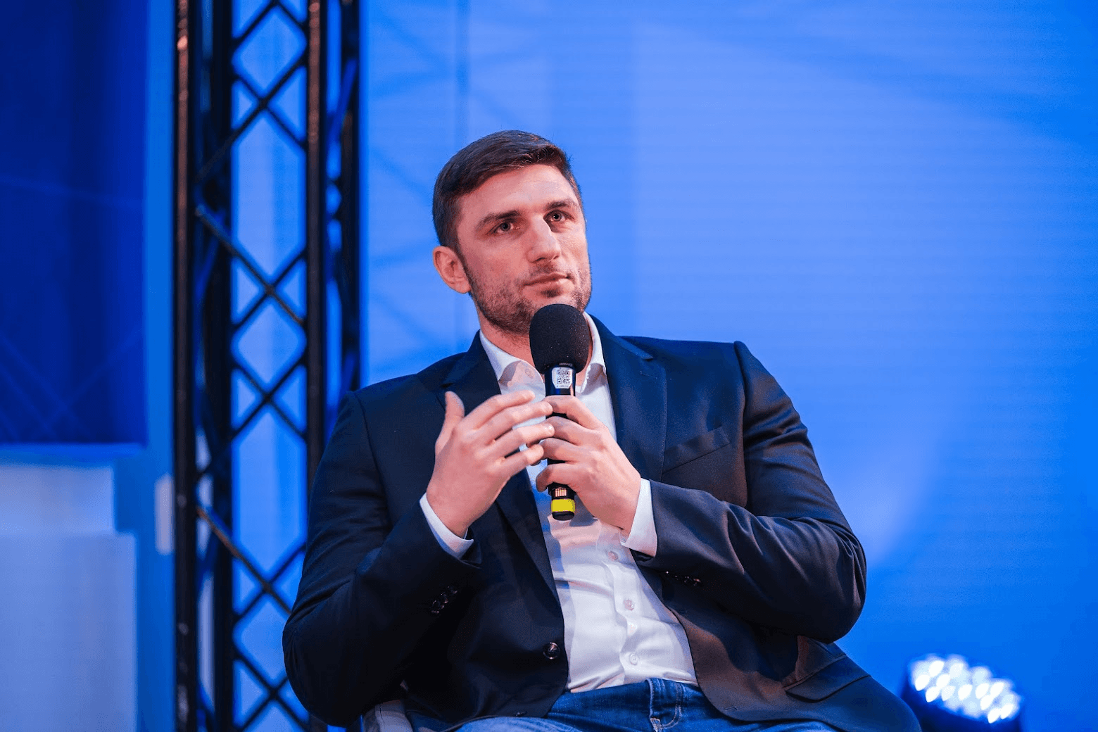 man sitting beside woman looking at a contract on DocuSign